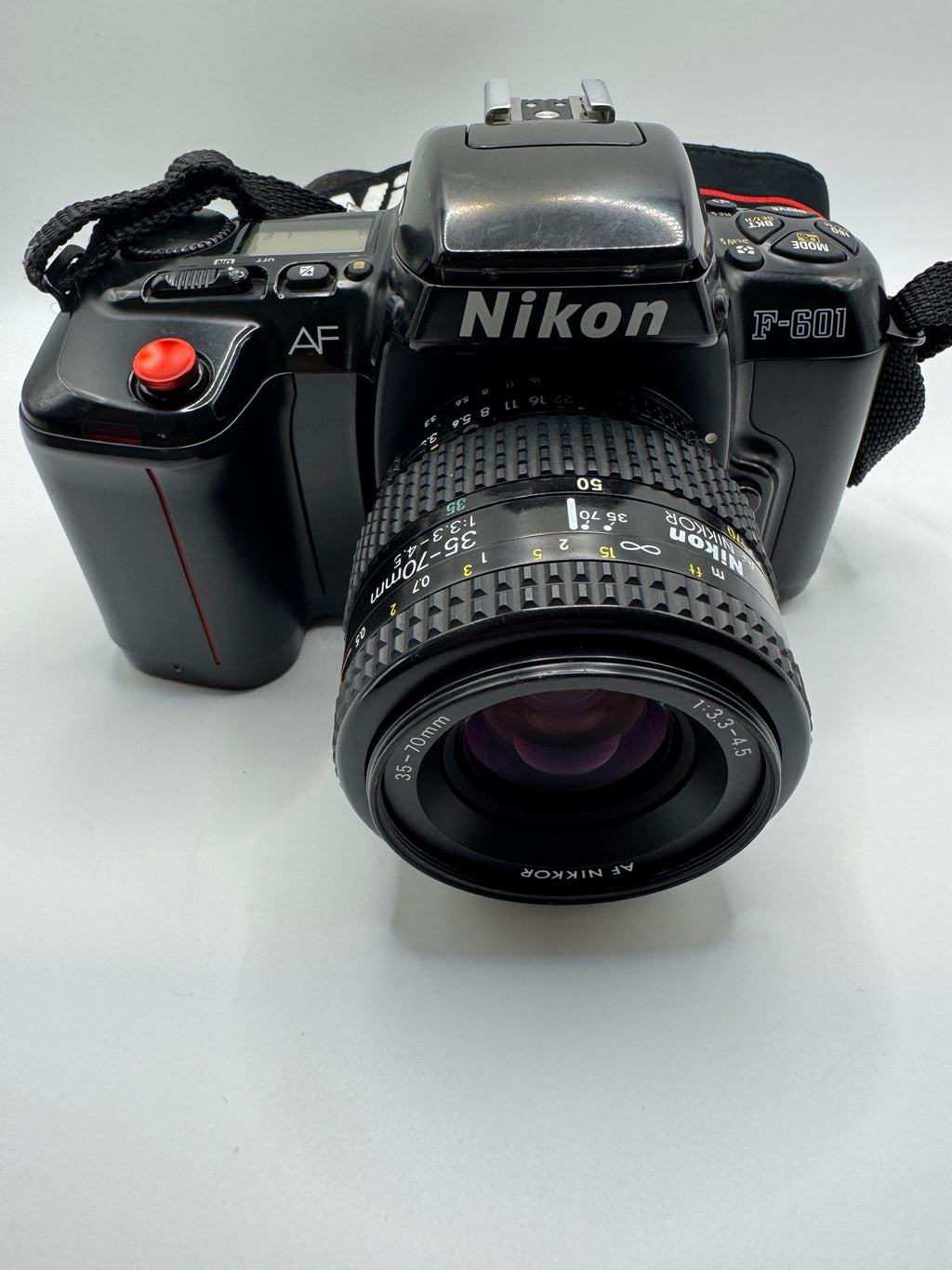 Nikon F-601 (N6006) 35mm Film Camera + AF Nikkor 35–70mm Lens
Fully Tested | Excellent Condition | Ready to Shoot