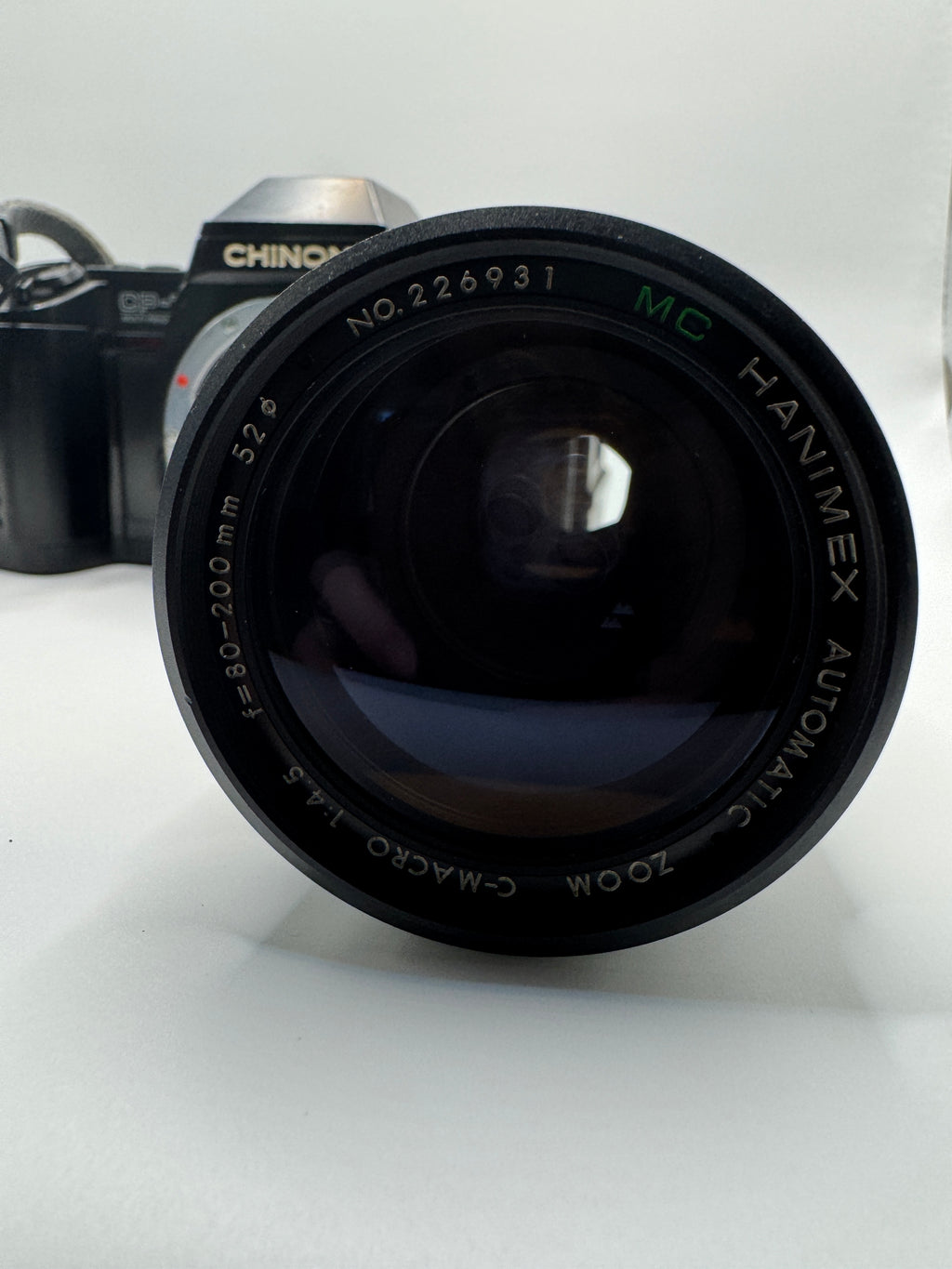 Chinon CP-7m 35mm Film Camera + Hanimex 80–200mm f/4.5 Zoom Lens Fully Tested | Excellent Condition | Ready to Shoot