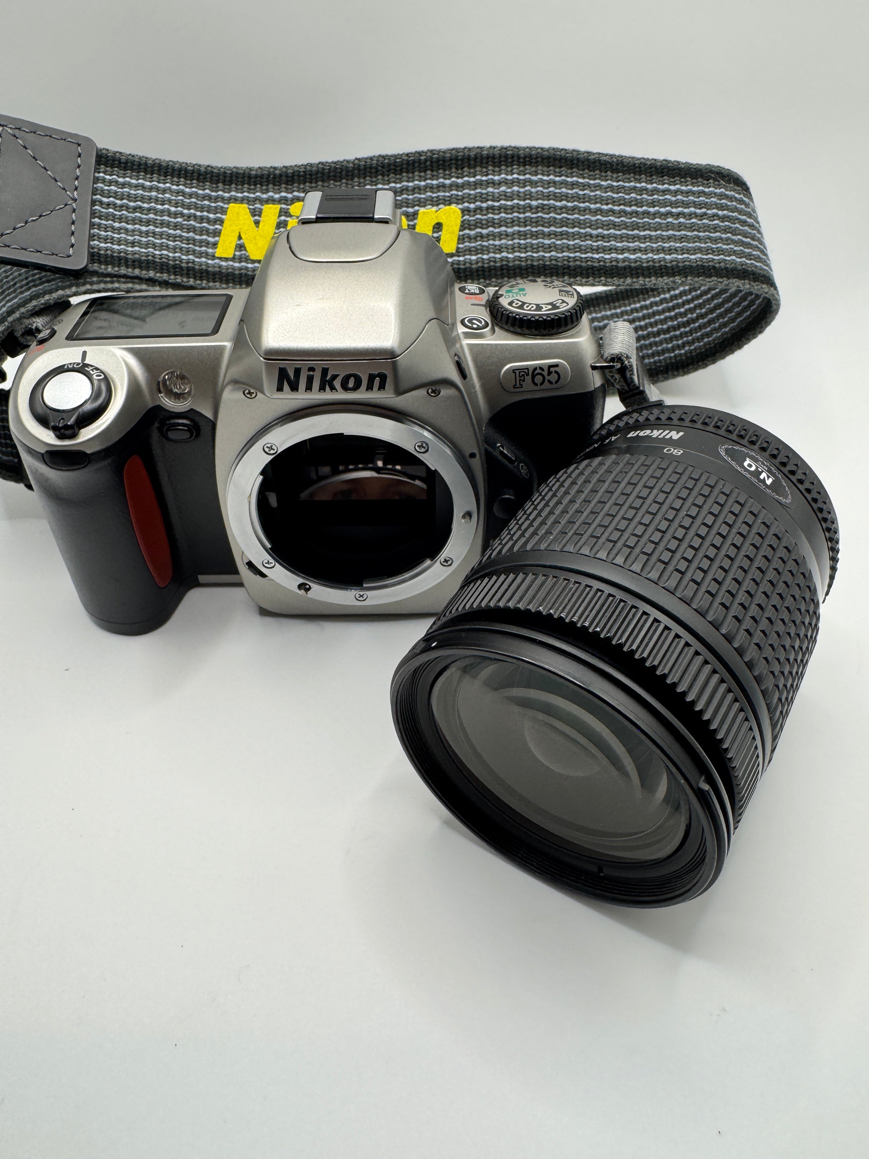 Nikon F65 (N65) 35mm Film Camera + Nikon 28–80mm Zoom Lens
Fully Tested | Excellent Condition | Ready to Shoot