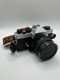Cosina CSR 35mm Film Camera + 50mm f/1.7 Lens
Fully Tested | Excellent Condition | Ready to Shoot