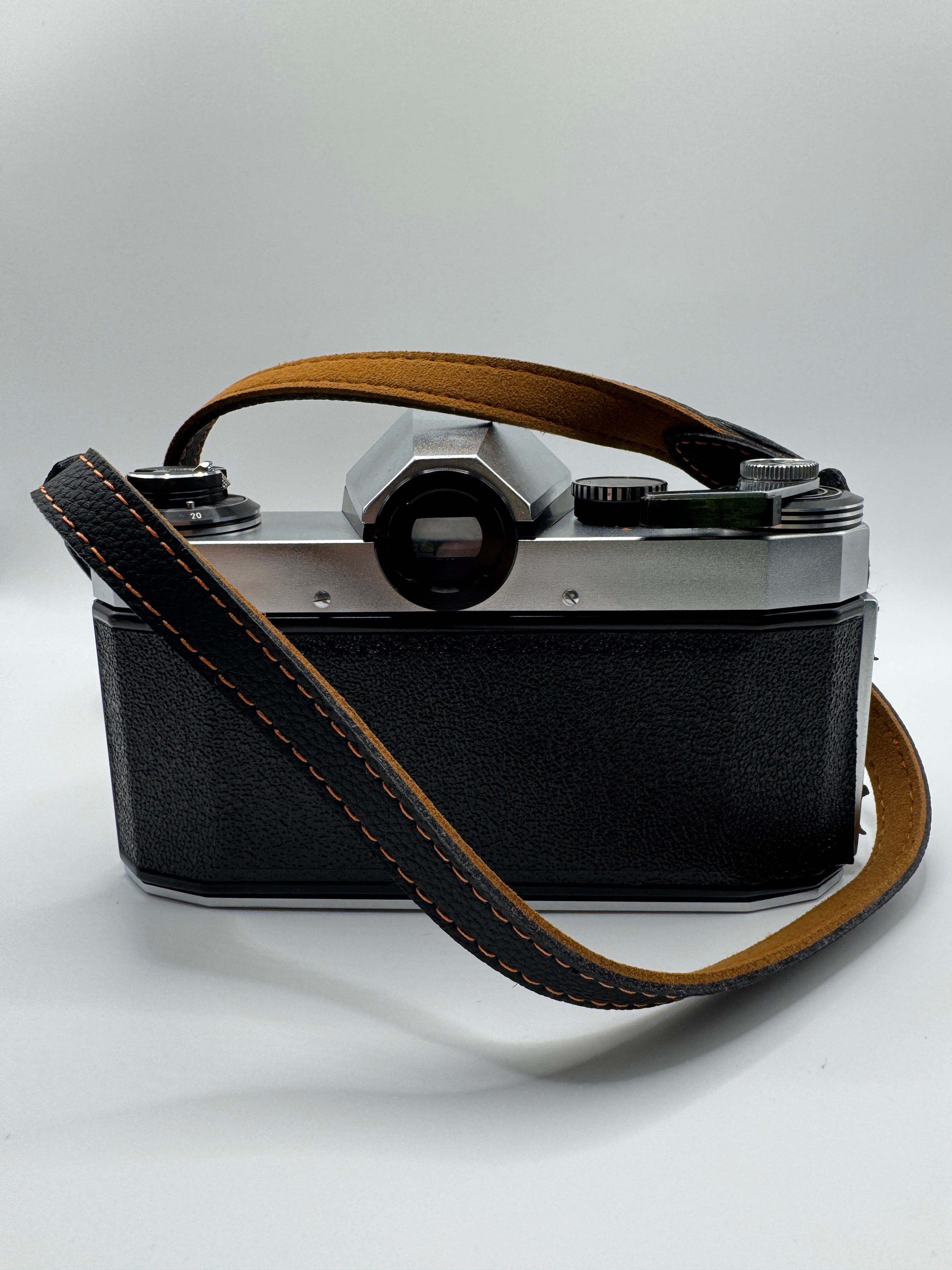 Praktica PL Nova I 35mm Film Camera + Photax 135mm f/3.5 Lens
Fully Tested | Excellent Condition | Fully Mechanical