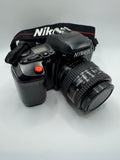 Nikon F-601 (N6006) 35mm Film Camera + AF Nikkor 35–70mm Lens
Fully Tested | Excellent Condition | Ready to Shoot