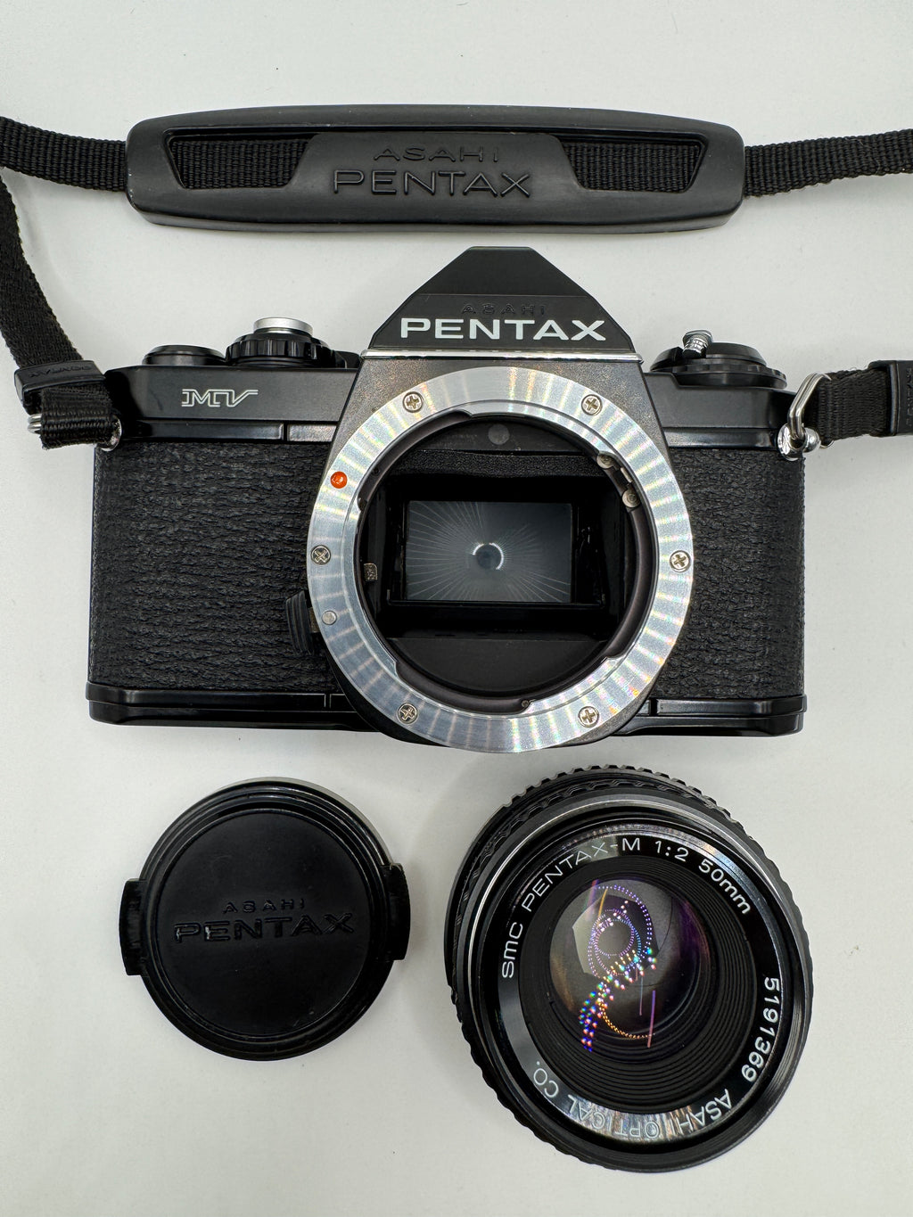 Pentax MV 35mm Film Camera + SMC Pentax-M 50mm f/2 Lens

Fully Tested | Fresh Batteries Included | Excellent Vintage Condition | Ready to Shoot