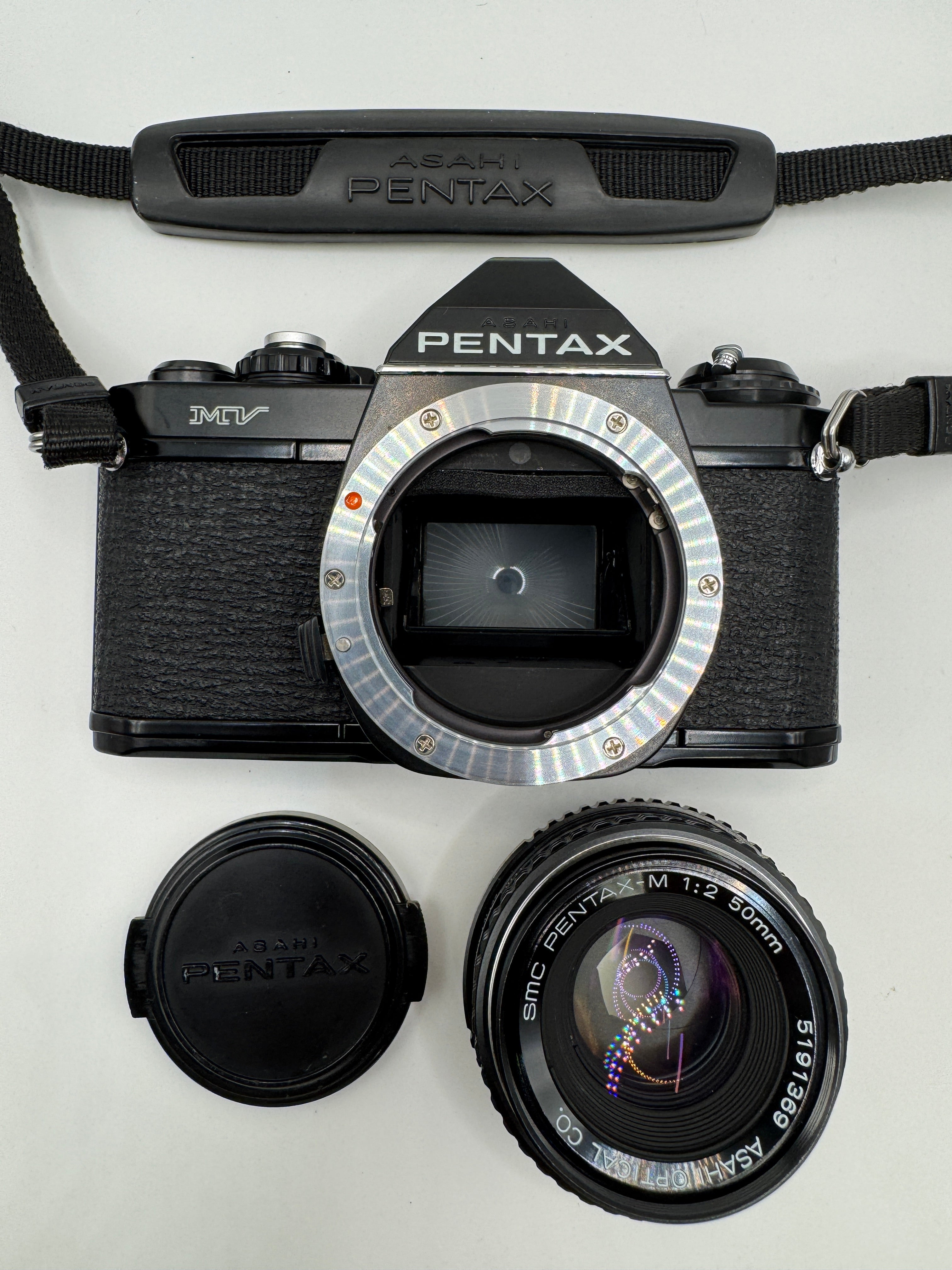 Pentax MV 35mm Film Camera + SMC Pentax-M 50mm f/2 Lens

Fully Tested | Fresh Batteries Included | Excellent Vintage Condition | Ready to Shoot