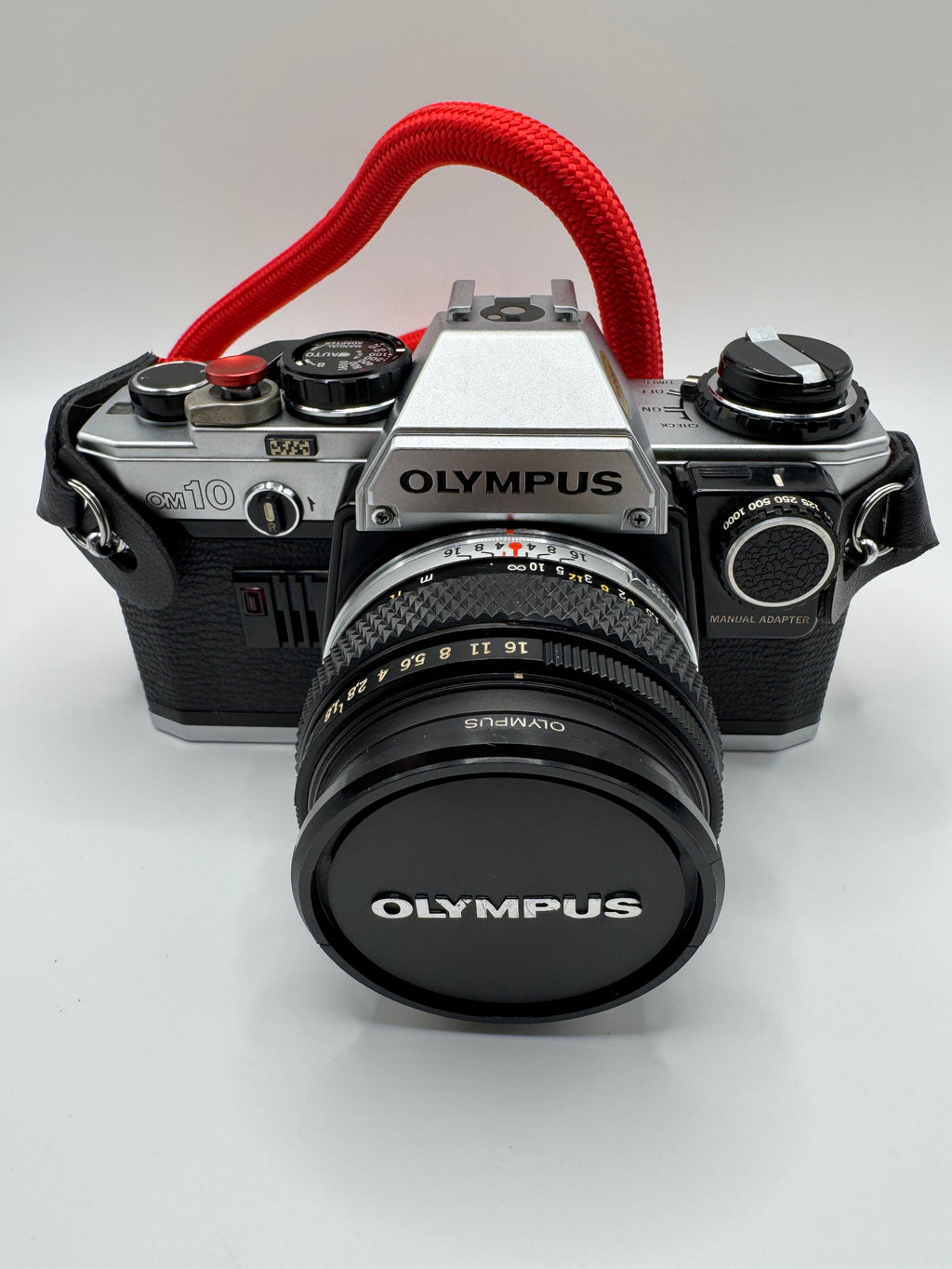 Olympus OM-10 35mm Film Camera + Zuiko Lens
Fully Tested | Excellent Condition | Ready to Shoot