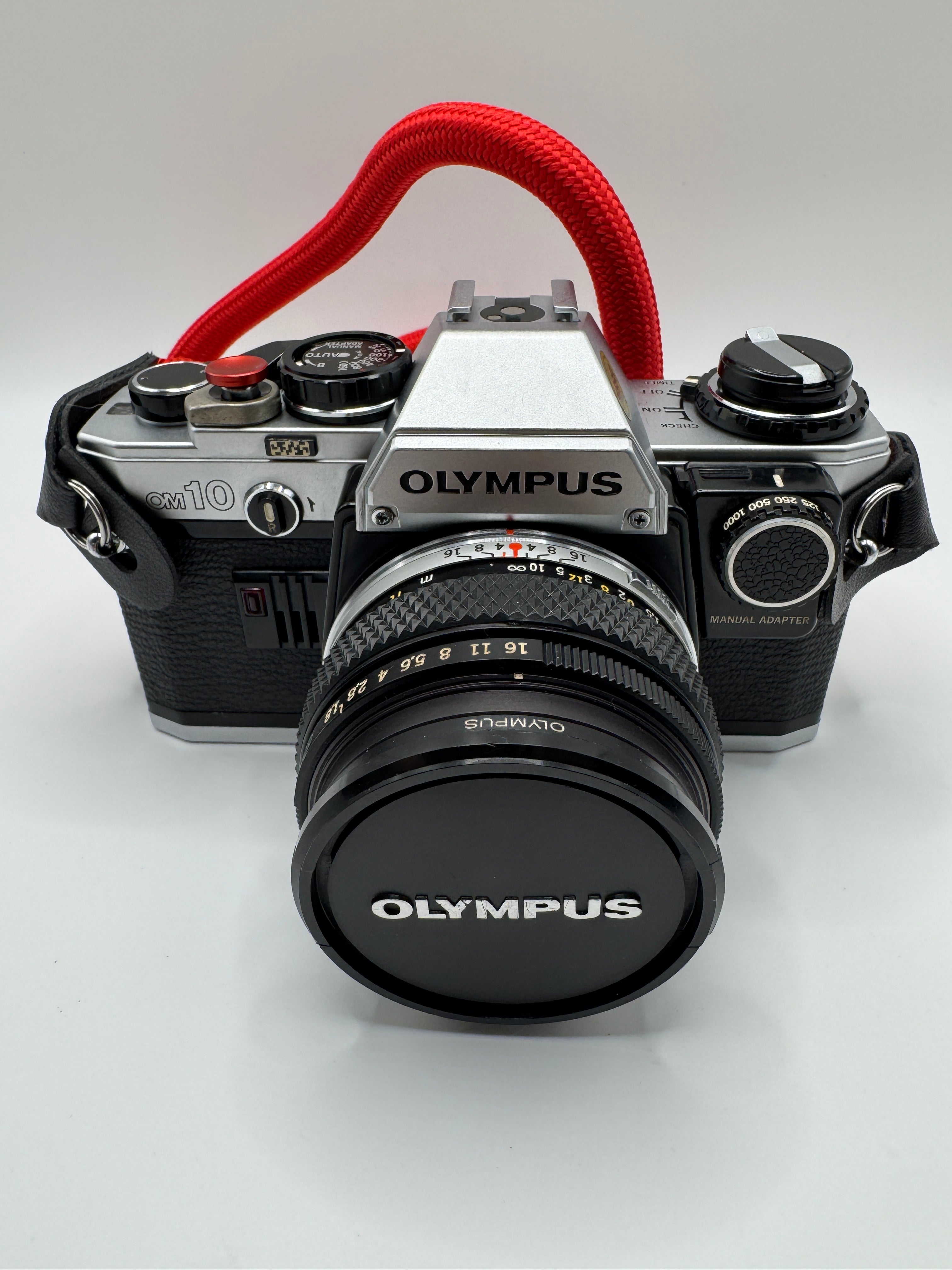 Olympus OM-10 35mm Film Camera + Zuiko Lens
Fully Tested | Excellent Condition | Ready to Shoot