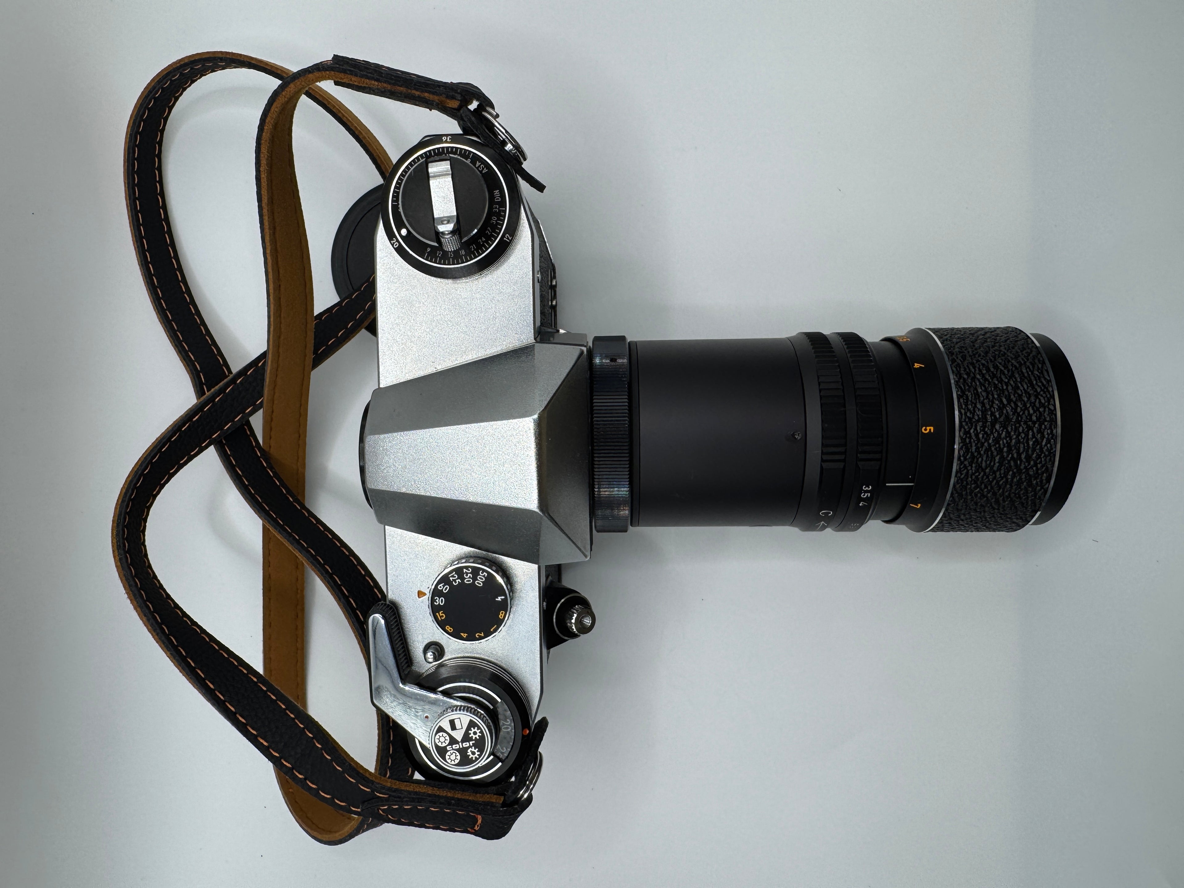 Praktica PL Nova I 35mm Film Camera + Photax 135mm f/3.5 Lens
Fully Tested | Excellent Condition | Fully Mechanical