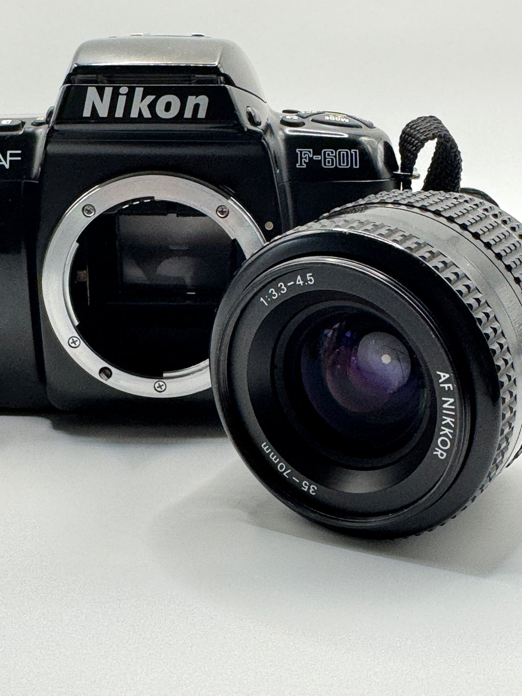 Nikon F-601 (N6006) 35mm Film Camera + AF Nikkor 35–70mm Lens
Fully Tested | Excellent Condition | Ready to Shoot