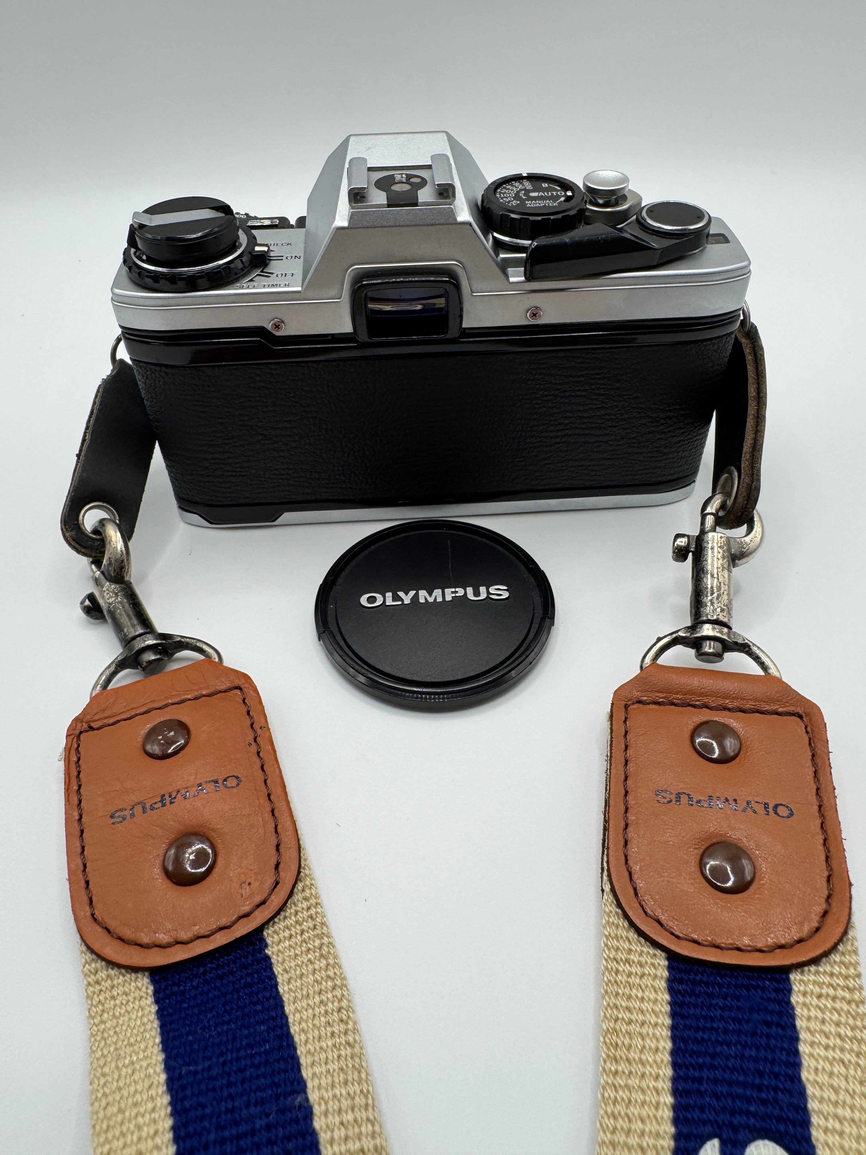Olympus OM-10 35mm Film Camera + Zuiko 50mm f/1.8 Lens
Fully Tested | Excellent Condition | Ready to Shoot