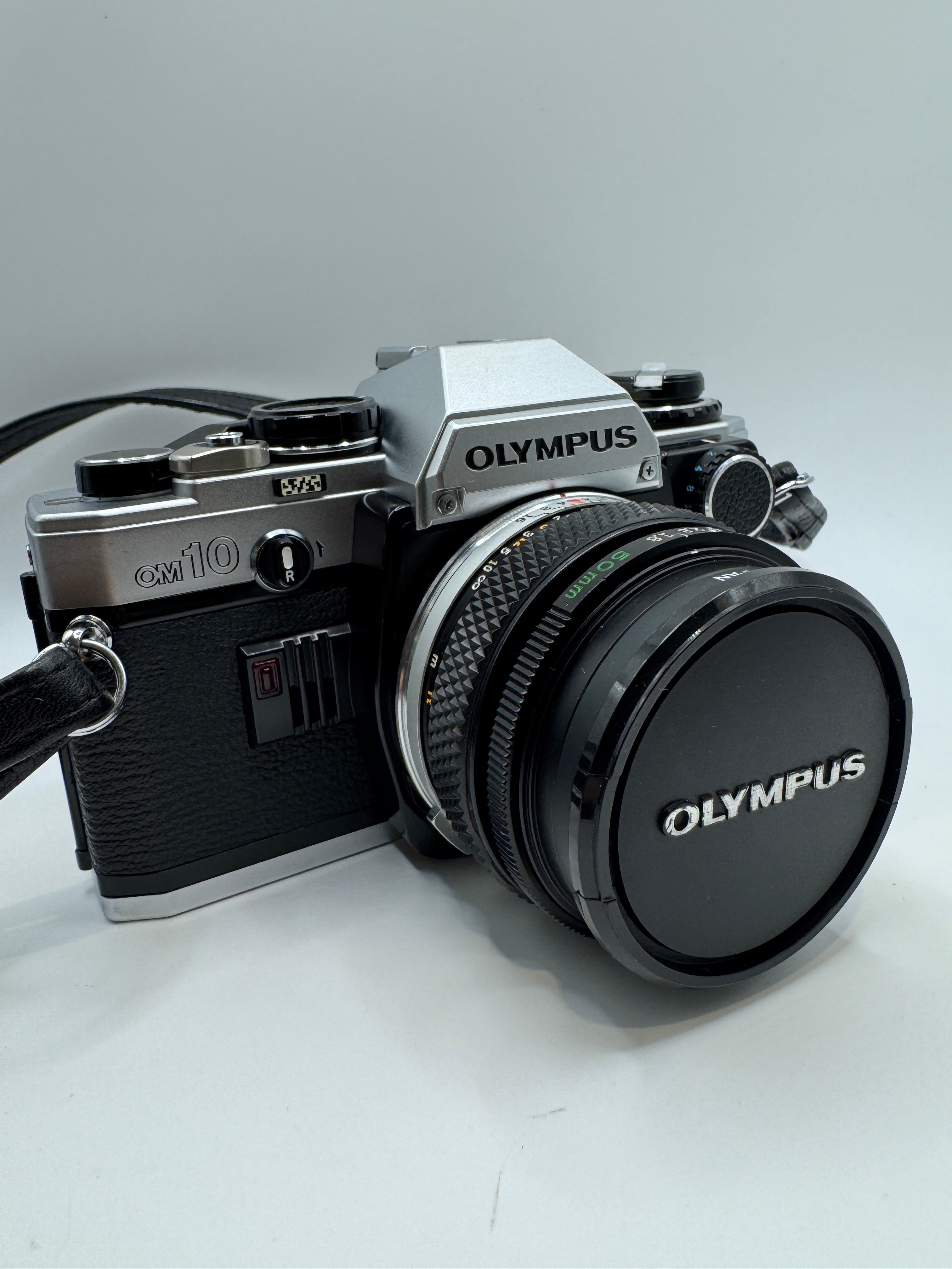 Olympus OM10 35mm Film Camera with Zuiko 50mm f/1.8 Lens Manual Adapter & Original Olympus Case