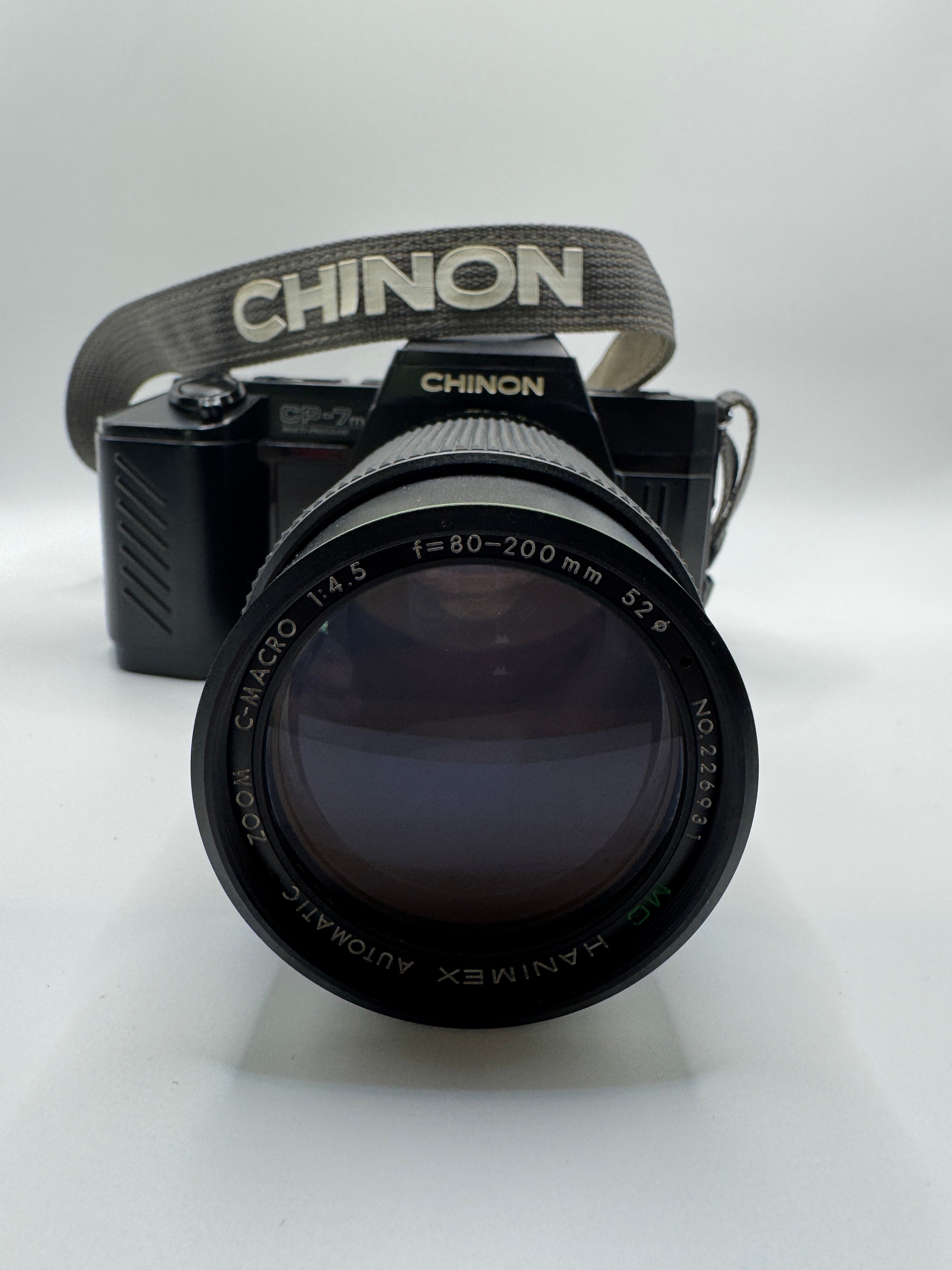 Chinon CP-7m 35mm Film Camera + Hanimex 80–200mm f/4.5 Zoom Lens
Fully Tested | Excellent Condition | Ready to Shoot
