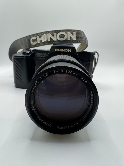 Chinon CP-7m 35mm Film Camera + Hanimex 80–200mm f/4.5 Zoom Lens
Fully Tested | Excellent Condition | Ready to Shoot