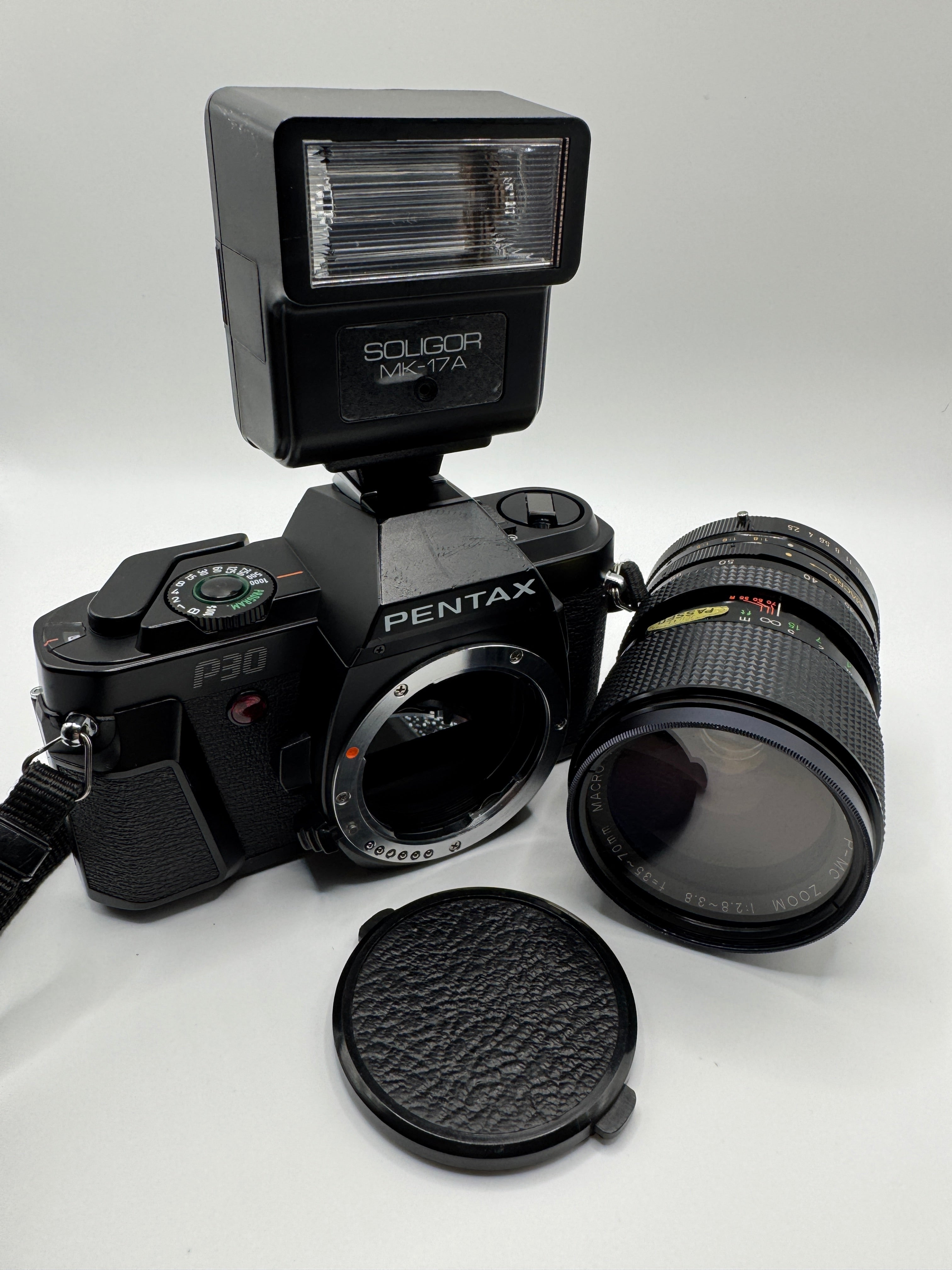 Pentax P30 35mm Film Camera + Zoom Macro Lens + Soligor Flash
Fully Tested | Excellent Condition | Complete Starter Kit