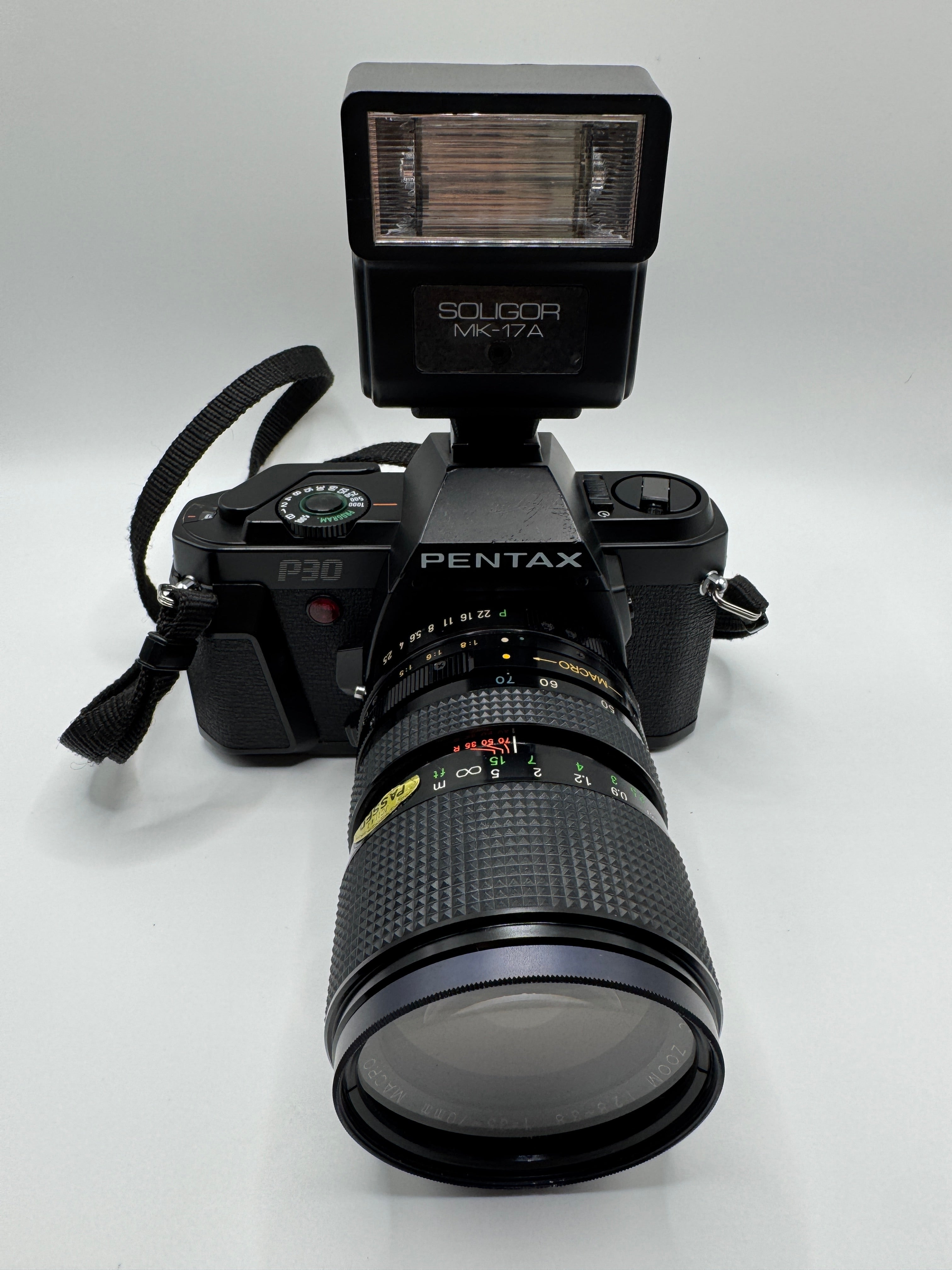 Pentax P30 35mm Film Camera + Zoom Macro Lens + Soligor Flash
Fully Tested | Excellent Condition | Complete Starter Kit