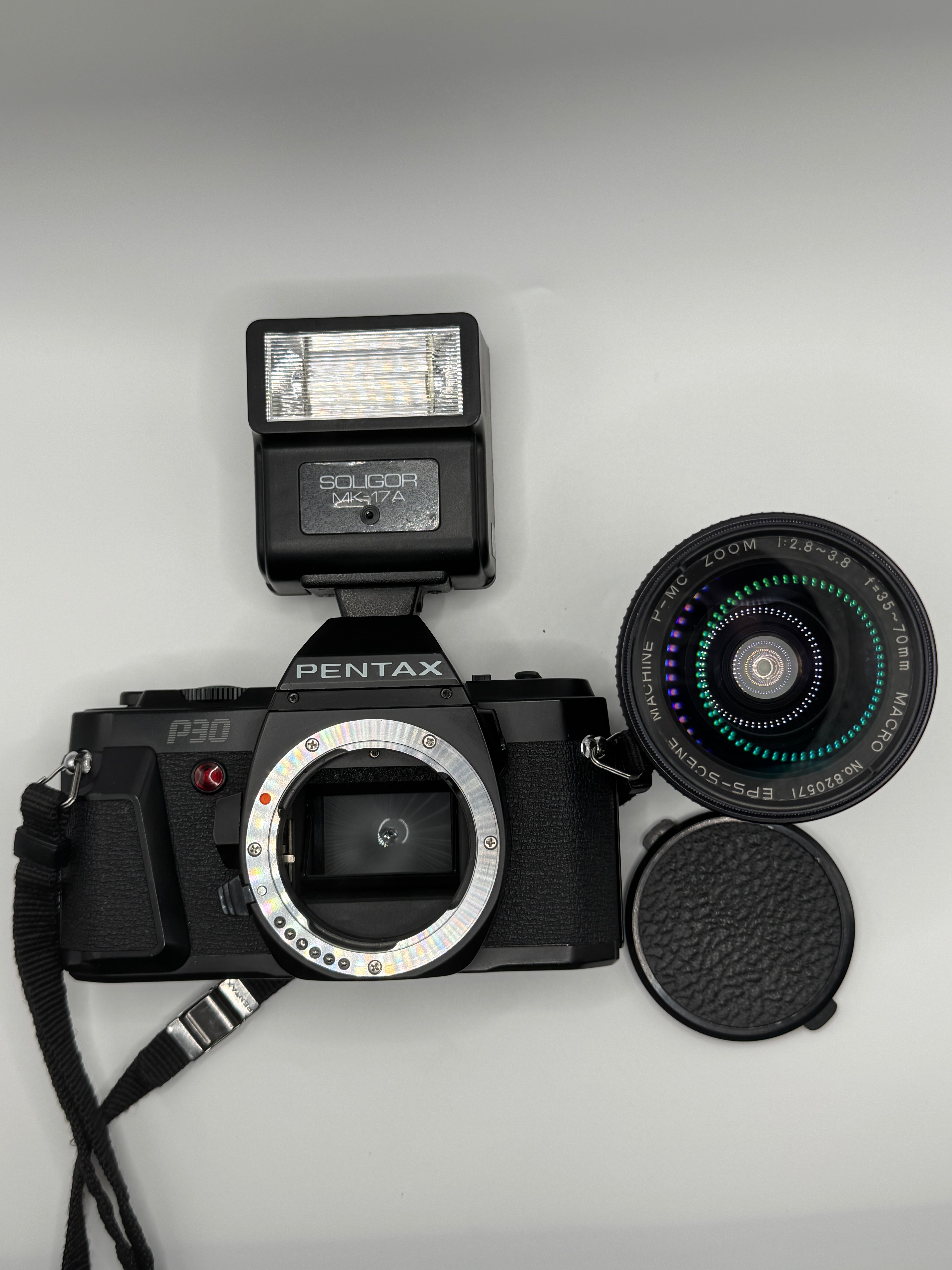 Pentax P30 35mm Film Camera + Zoom Macro Lens + Soligor Flash
Fully Tested | Excellent Condition | Complete Starter Kit