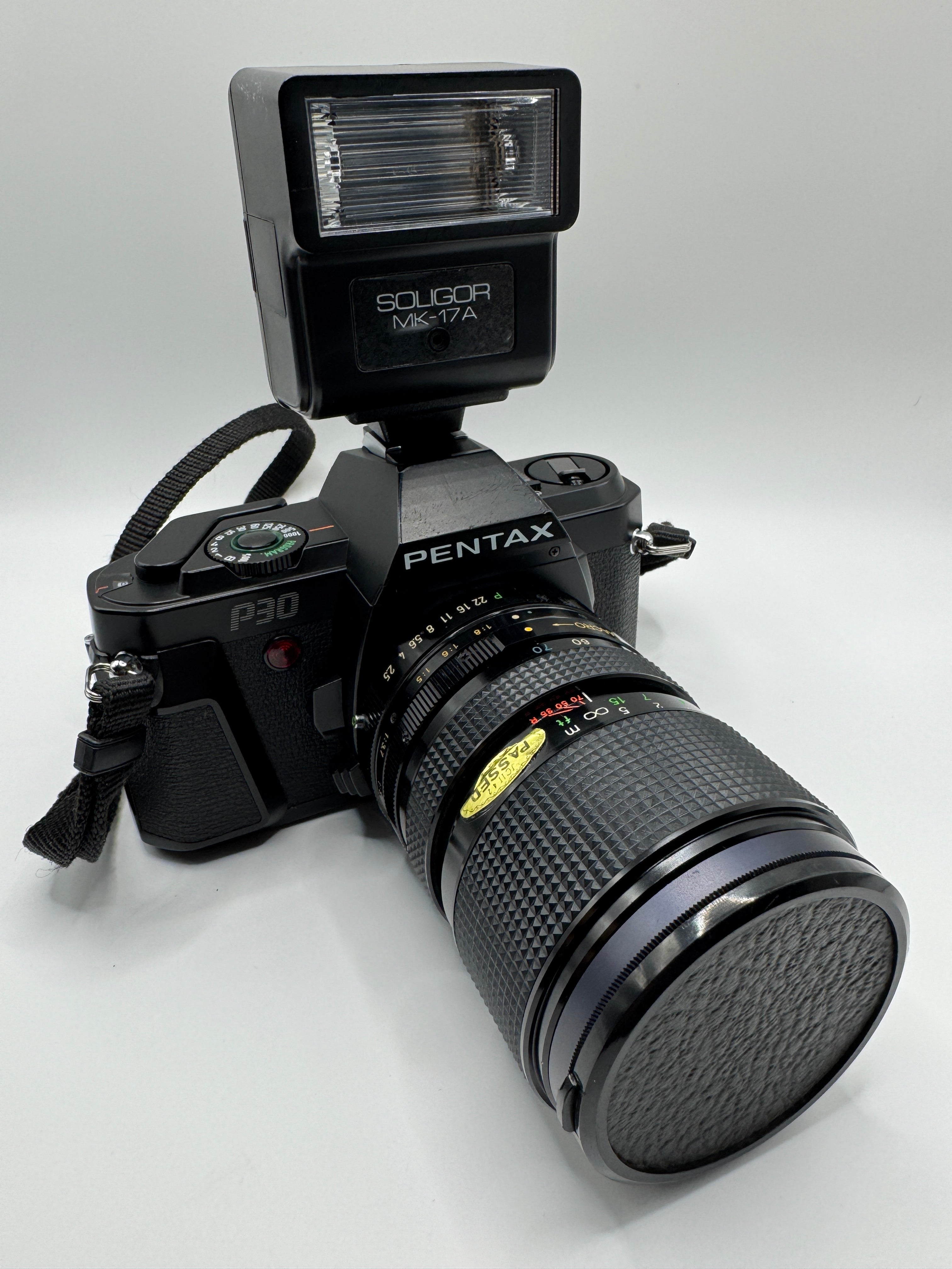 Pentax P30 35mm Film Camera + Zoom Macro Lens + Soligor Flash
Fully Tested | Excellent Condition | Complete Starter Kit