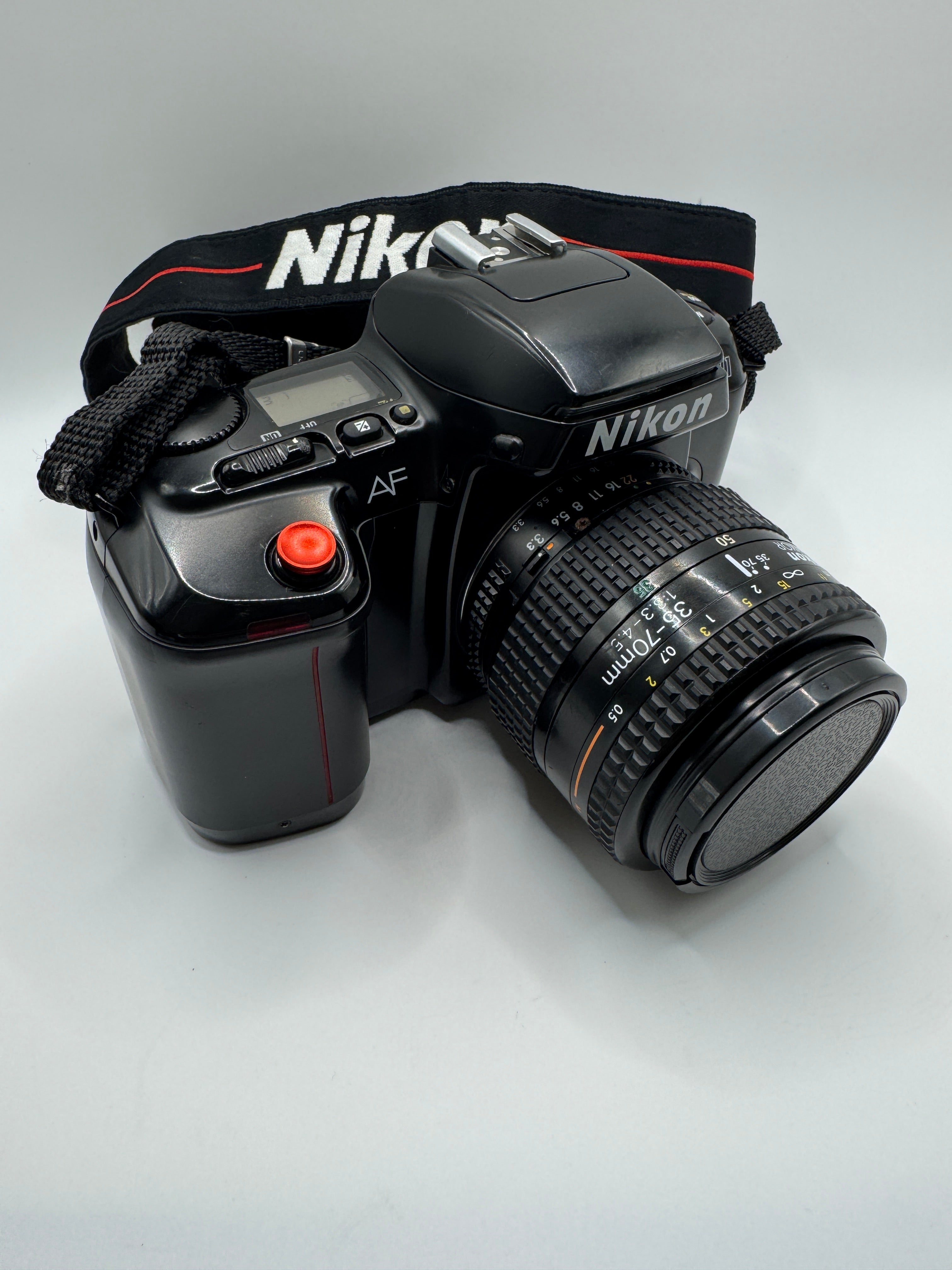 Nikon F-601 (N6006) 35mm Film Camera + AF Nikkor 35–70mm Lens
Fully Tested | Excellent Condition | Ready to Shoot