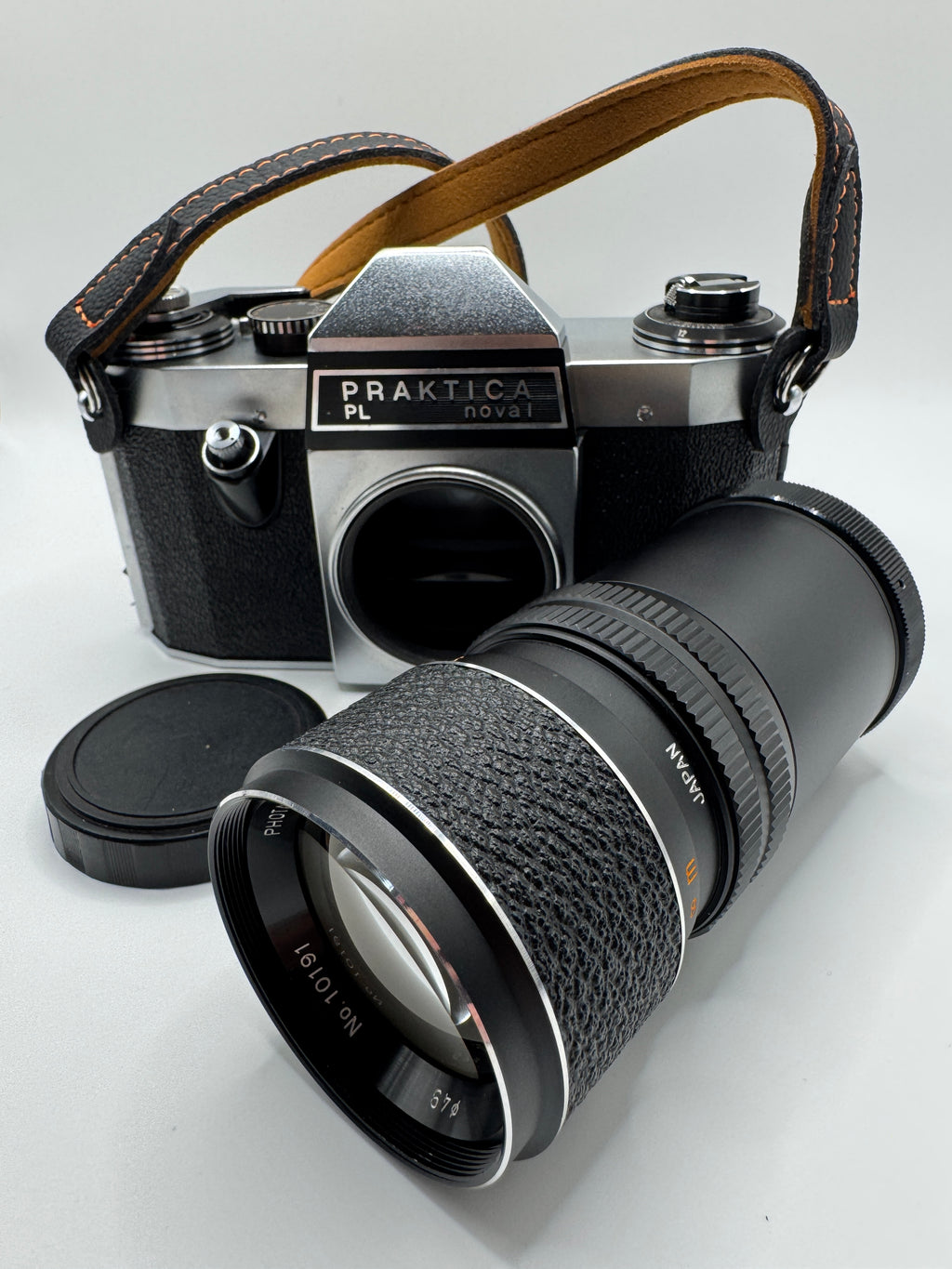 Praktica PL Nova I 35mm Film Camera + Photax 135mm f/3.5 Lens
Fully Tested | Excellent Condition | Fully Mechanical