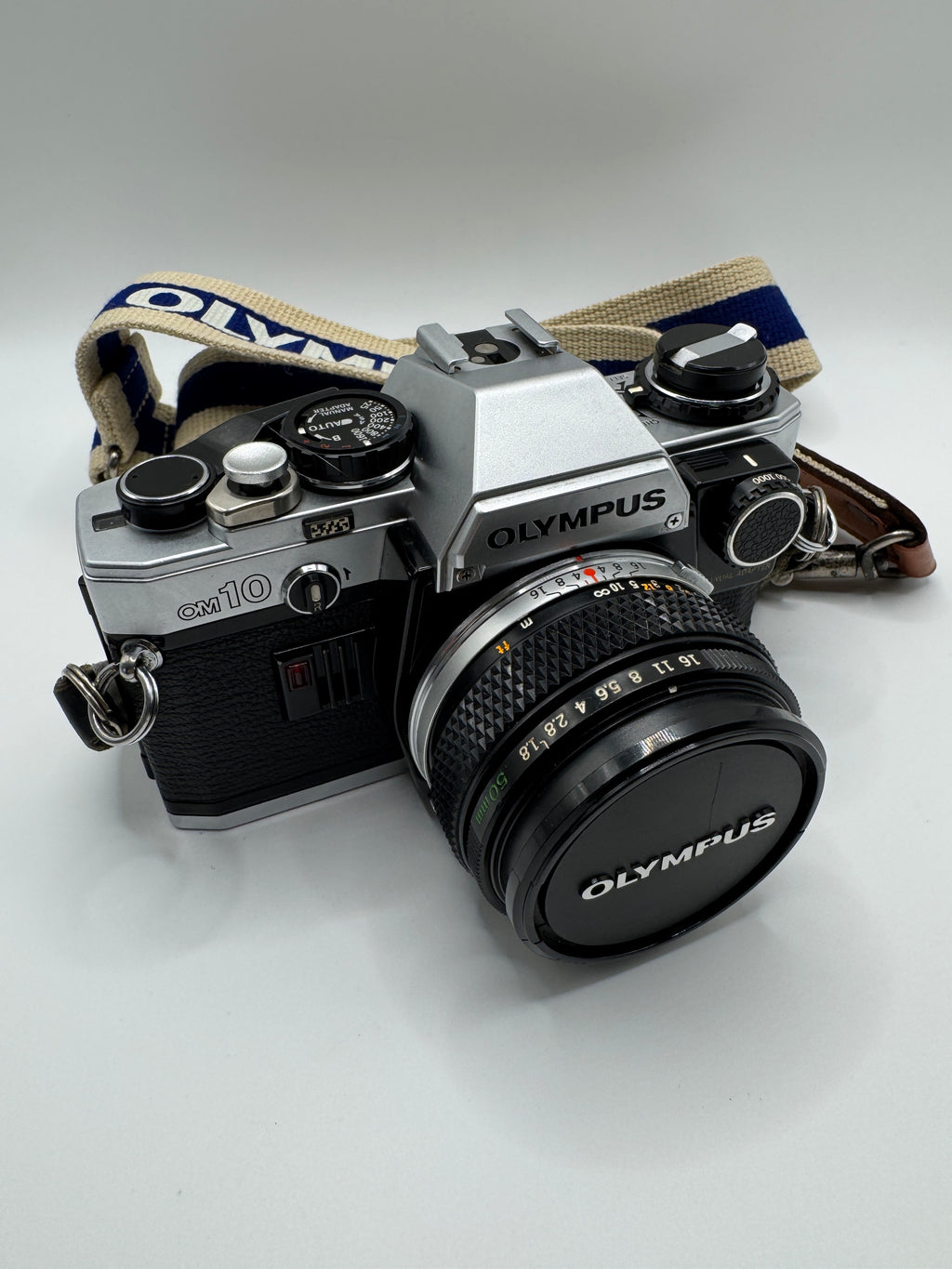 Olympus OM-10 35mm Film Camera + Zuiko 50mm f/1.8 Lens
Fully Tested | Excellent Condition | Ready to Shoot