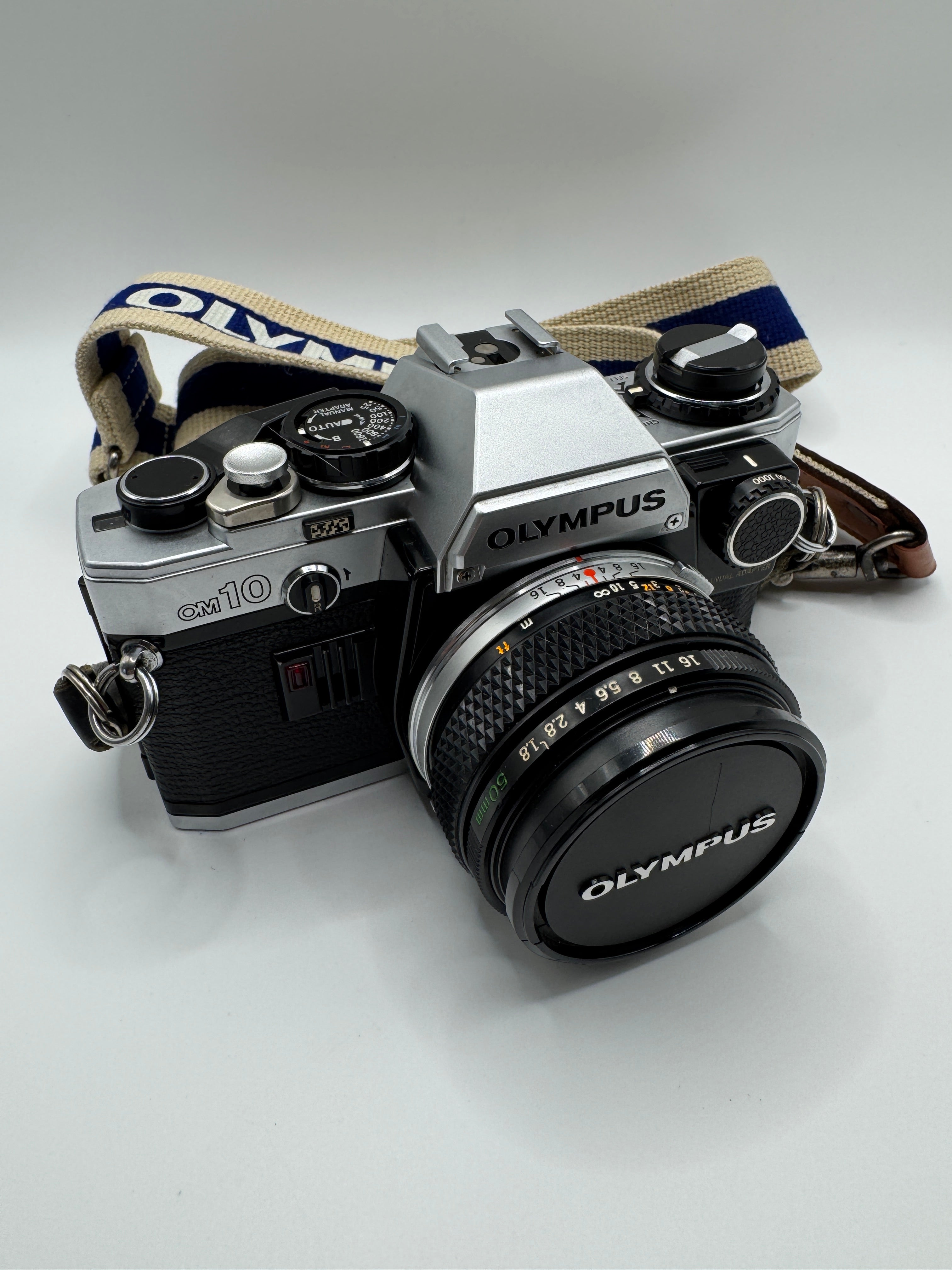 Olympus OM-10 35mm Film Camera + Zuiko 50mm f/1.8 Lens
Fully Tested | Excellent Condition | Ready to Shoot