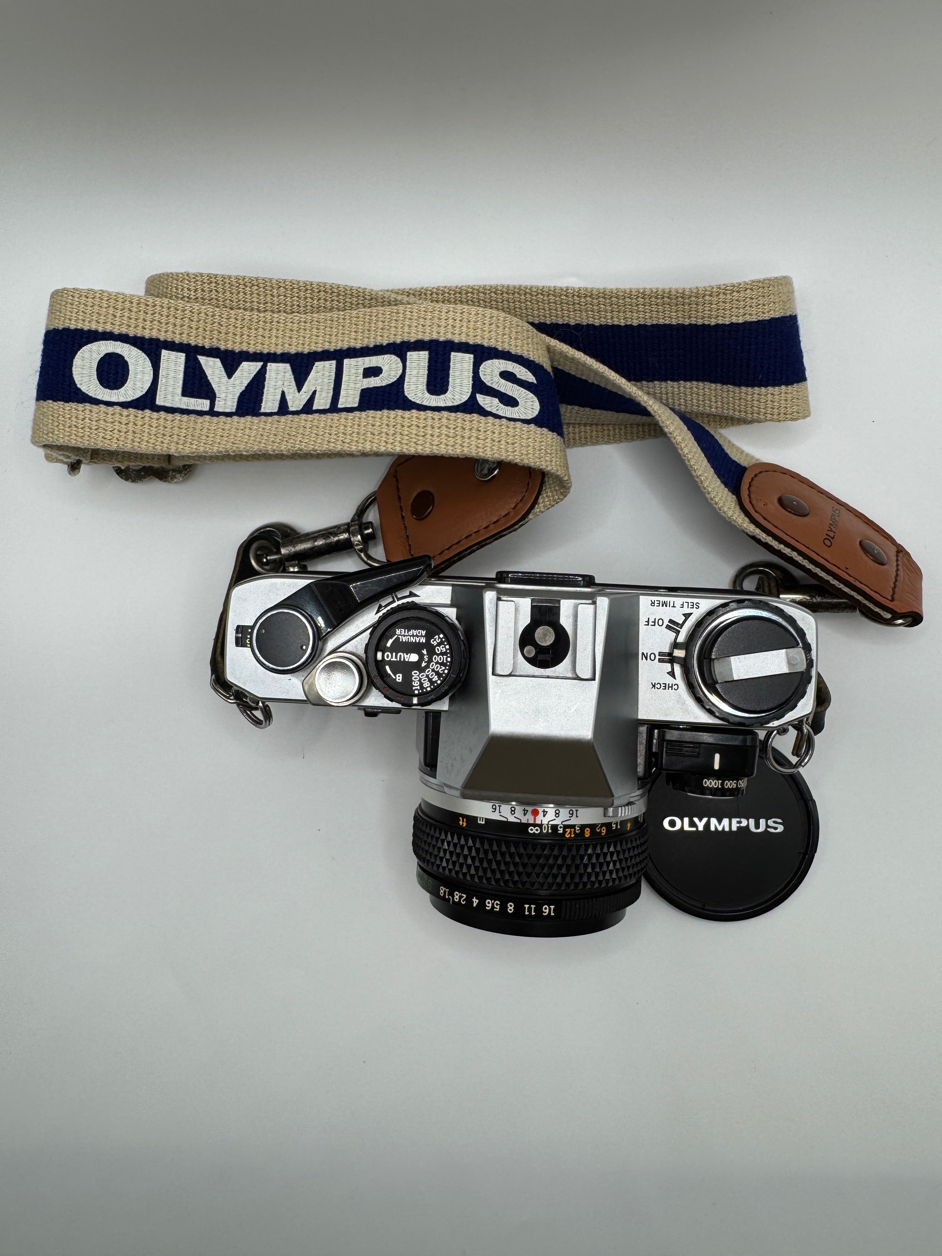 Olympus OM-10 35mm Film Camera + Zuiko 50mm f/1.8 Lens
Fully Tested | Excellent Condition | Ready to Shoot