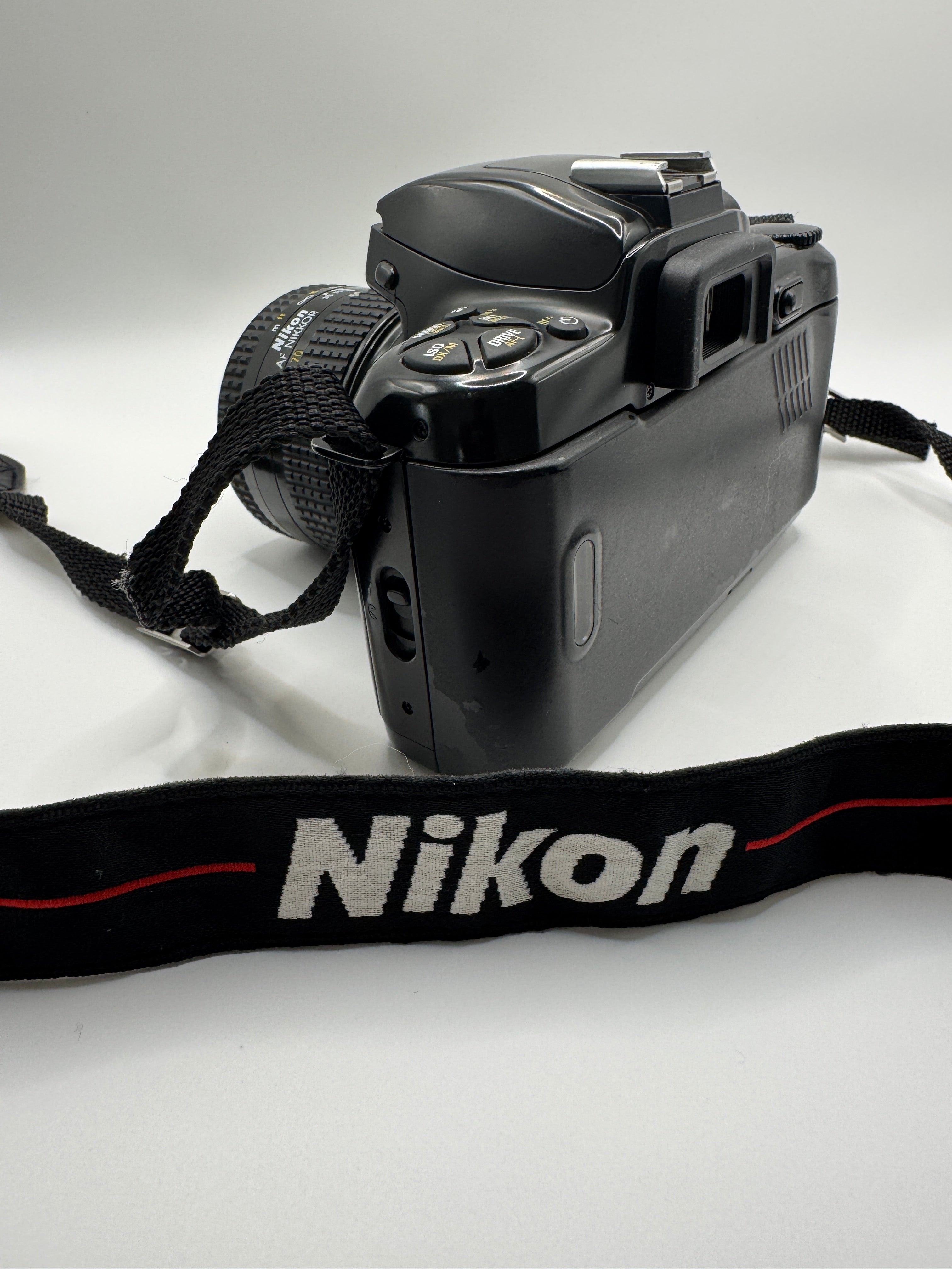 Nikon F-601 (N6006) 35mm Film Camera + AF Nikkor 35–70mm Lens
Fully Tested | Excellent Condition | Ready to Shoot