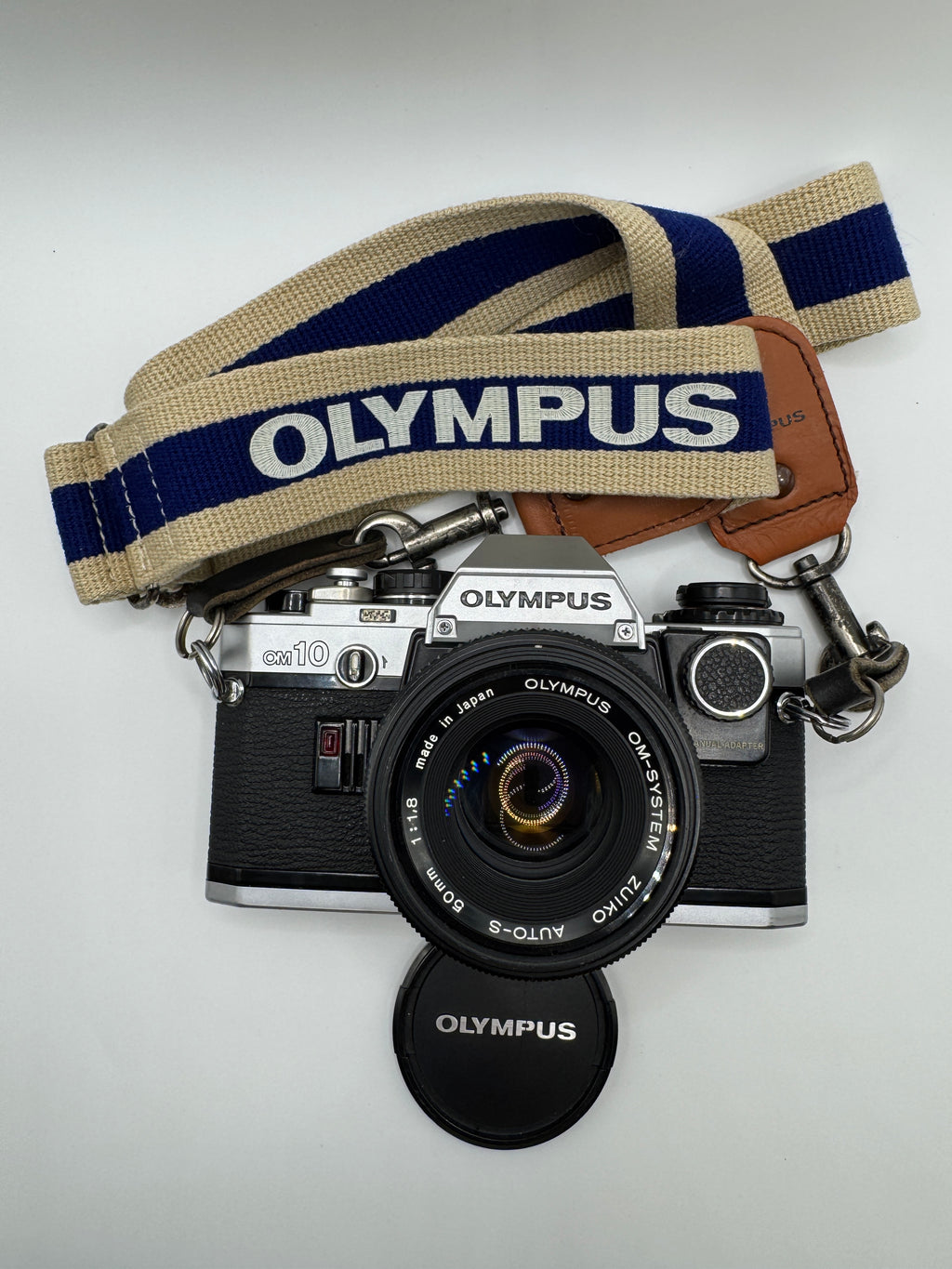Olympus OM-10 35mm Film Camera + Zuiko 50mm f/1.8 Lens
Fully Tested | Excellent Condition | Ready to Shoot