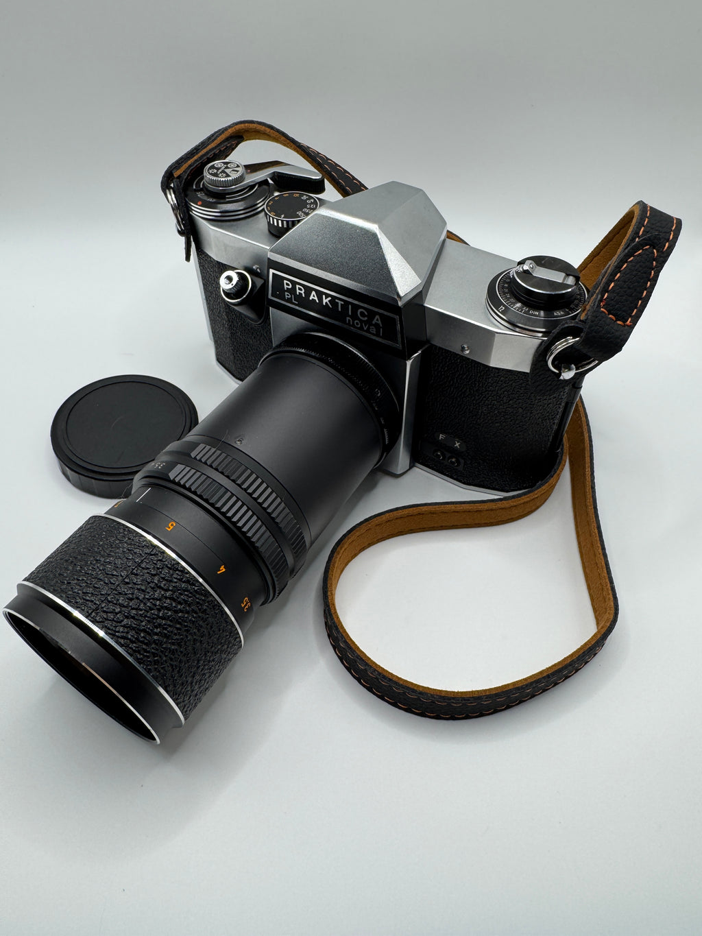Praktica PL Nova I 35mm Film Camera + Photax 135mm f/3.5 Lens
Fully Tested | Excellent Condition | Fully Mechanical