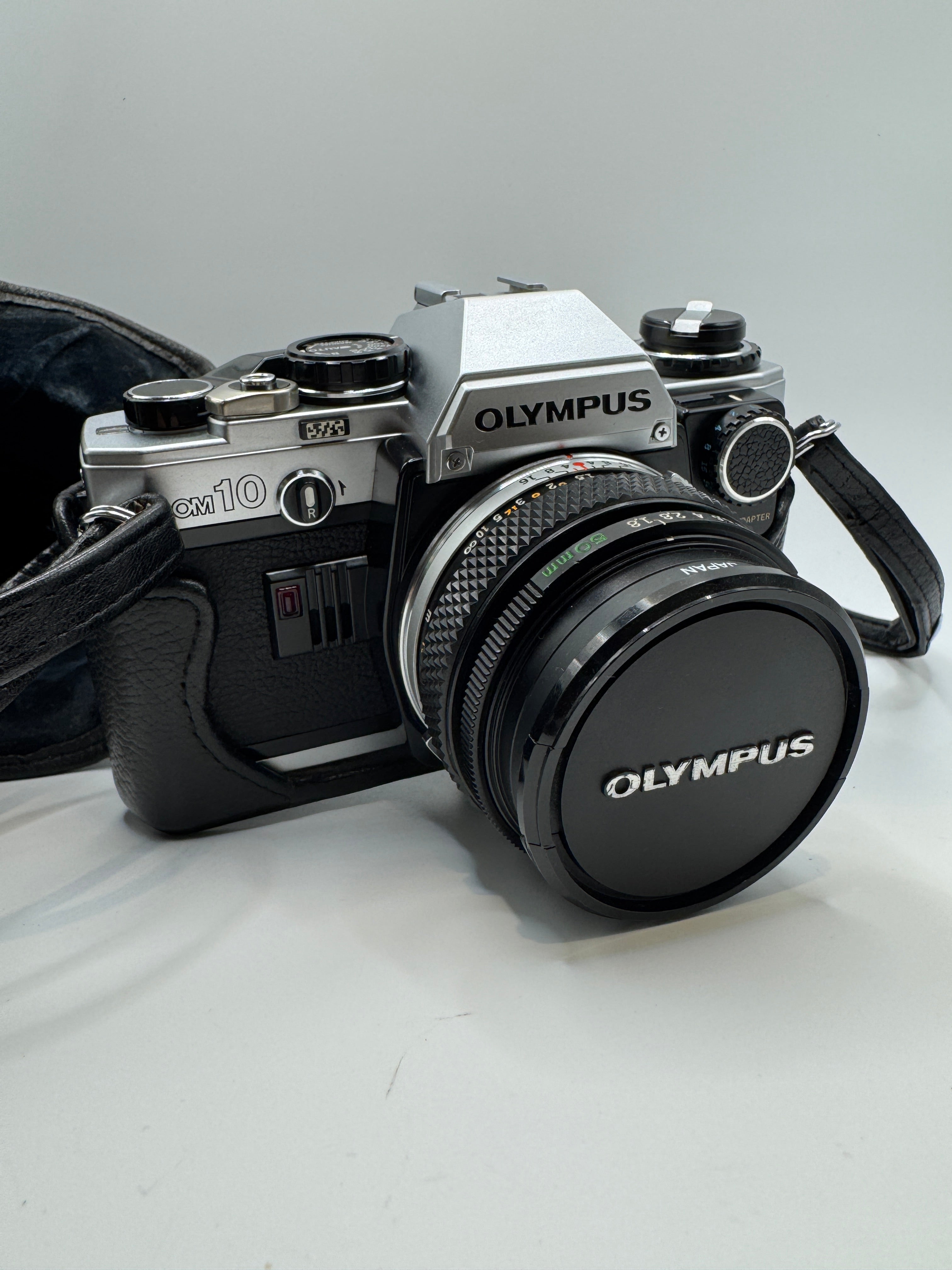 Olympus OM10 35mm Film Camera with Zuiko 50mm f/1.8 Lens Manual Adapter & Original Olympus Case