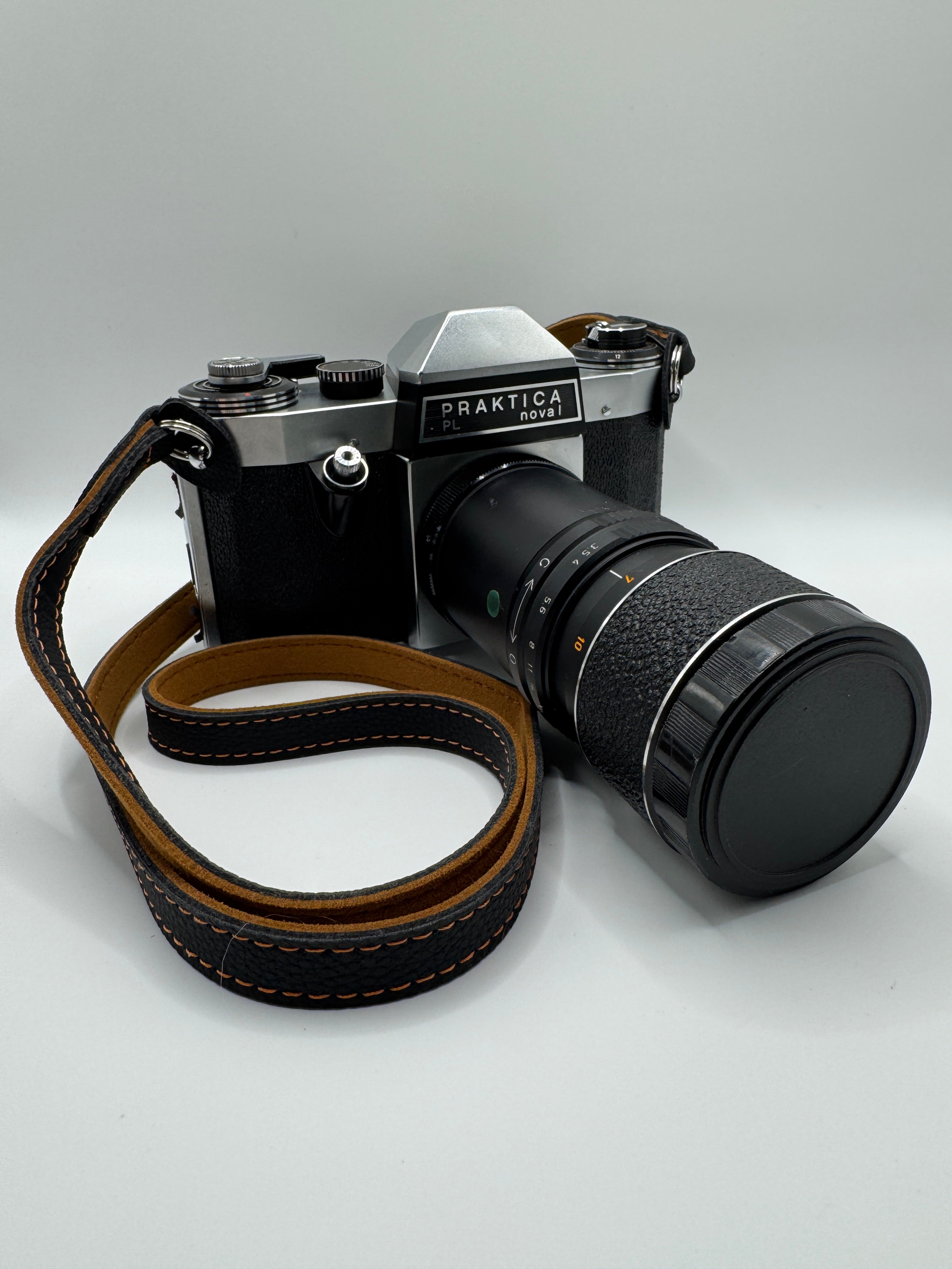 Praktica PL Nova I 35mm Film Camera + Photax 135mm f/3.5 Lens
Fully Tested | Excellent Condition | Fully Mechanical