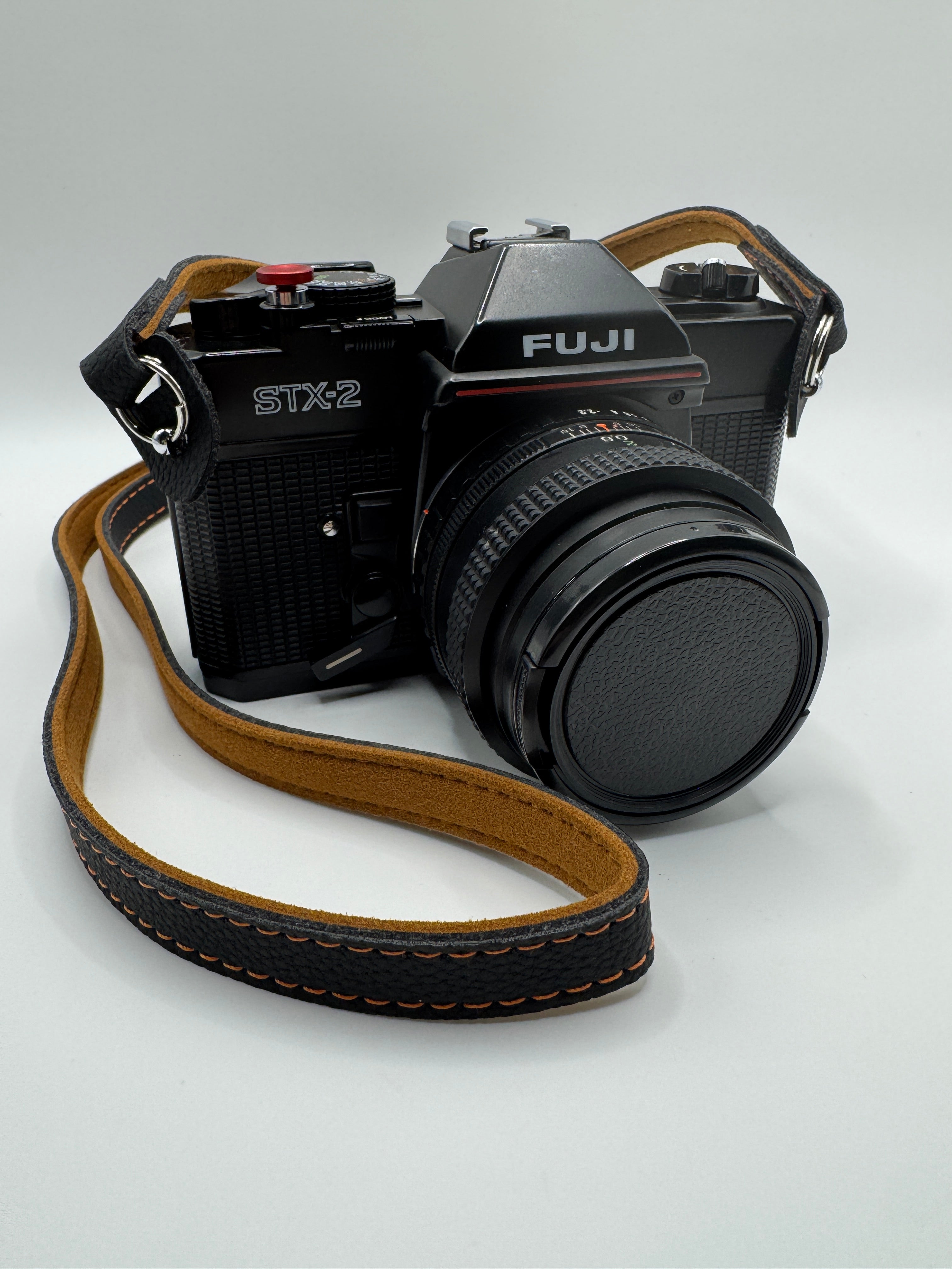 Fuji STX-2 35mm Film Camera + Fujinon 55mm f/2.2 Lens
Fully Tested | Excellent Condition | Ready to Shoot