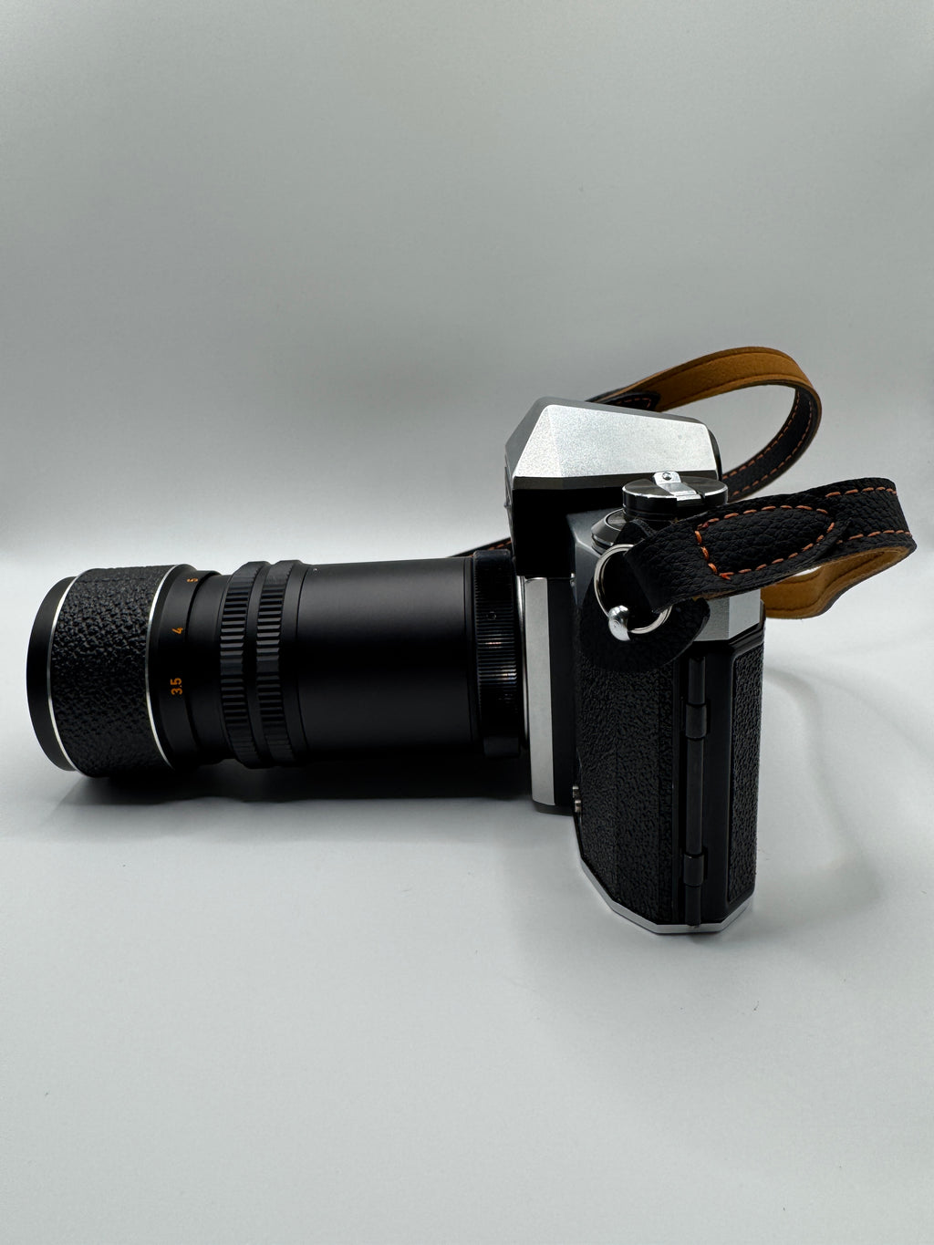 Praktica PL Nova I 35mm Film Camera + Photax 135mm f/3.5 Lens
Fully Tested | Excellent Condition | Fully Mechanical