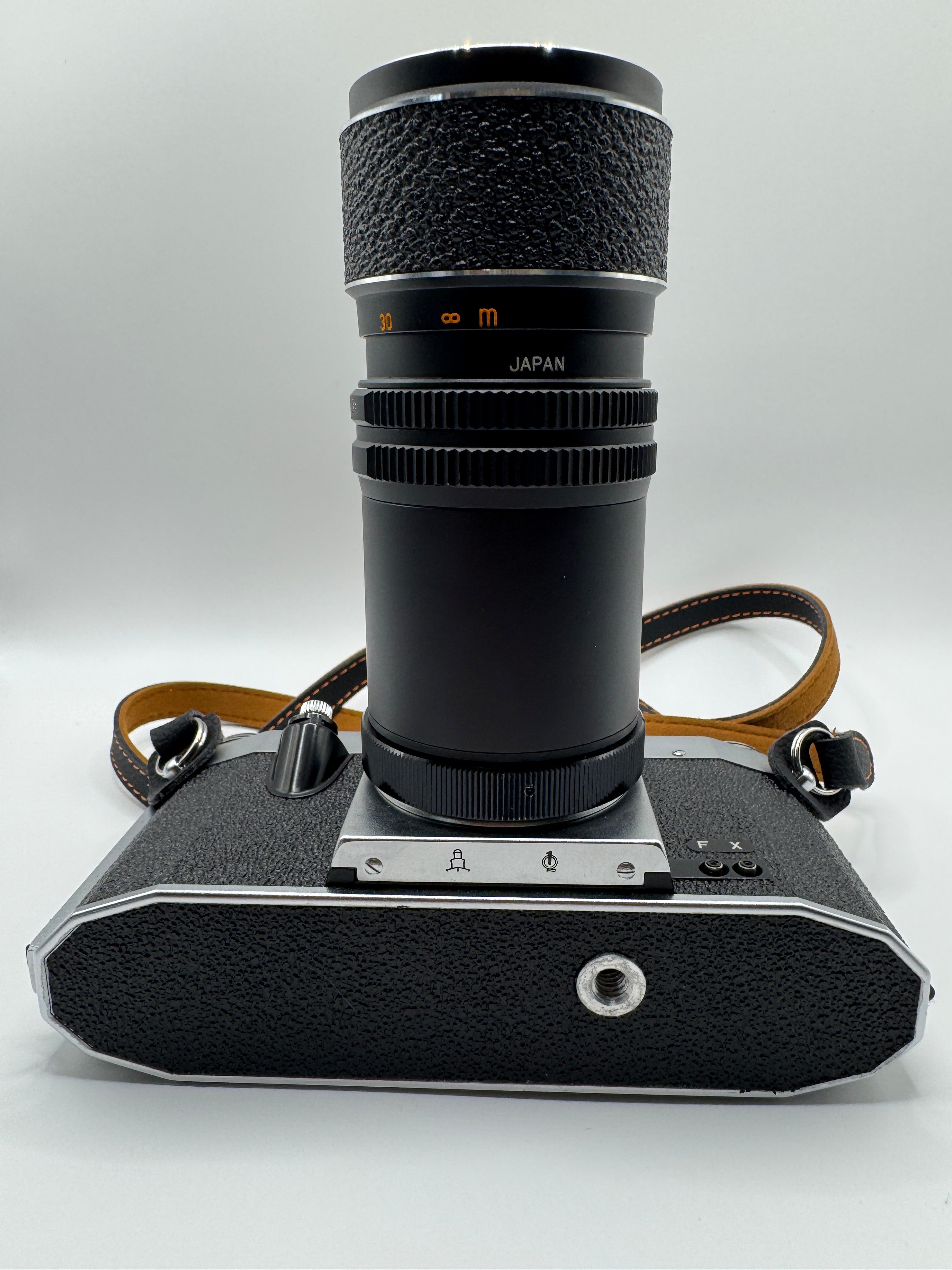 Praktica PL Nova I 35mm Film Camera + Photax 135mm f/3.5 Lens
Fully Tested | Excellent Condition | Fully Mechanical