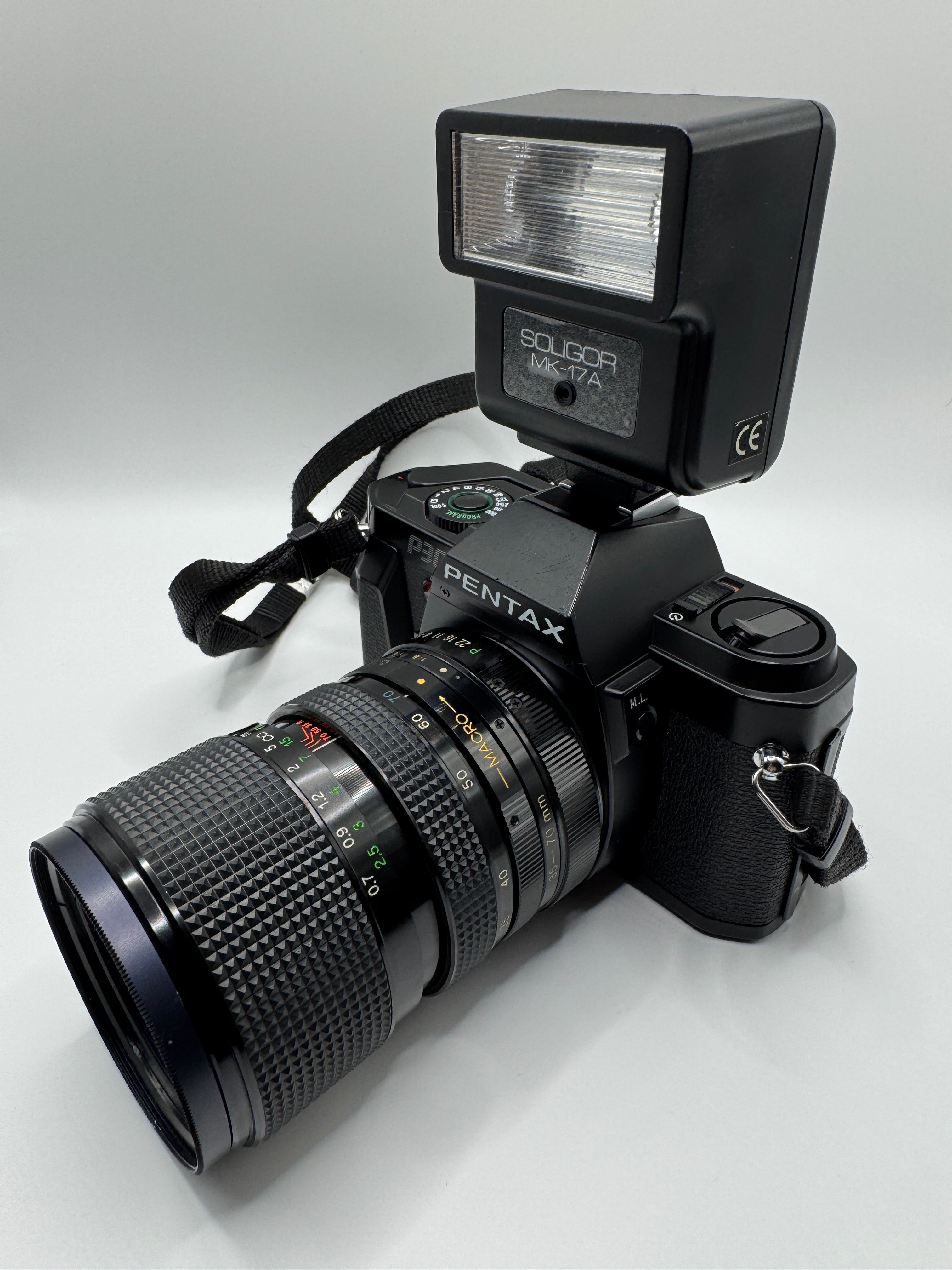 Pentax P30 35mm Film Camera + Zoom Macro Lens + Soligor Flash
Fully Tested | Excellent Condition | Complete Starter Kit