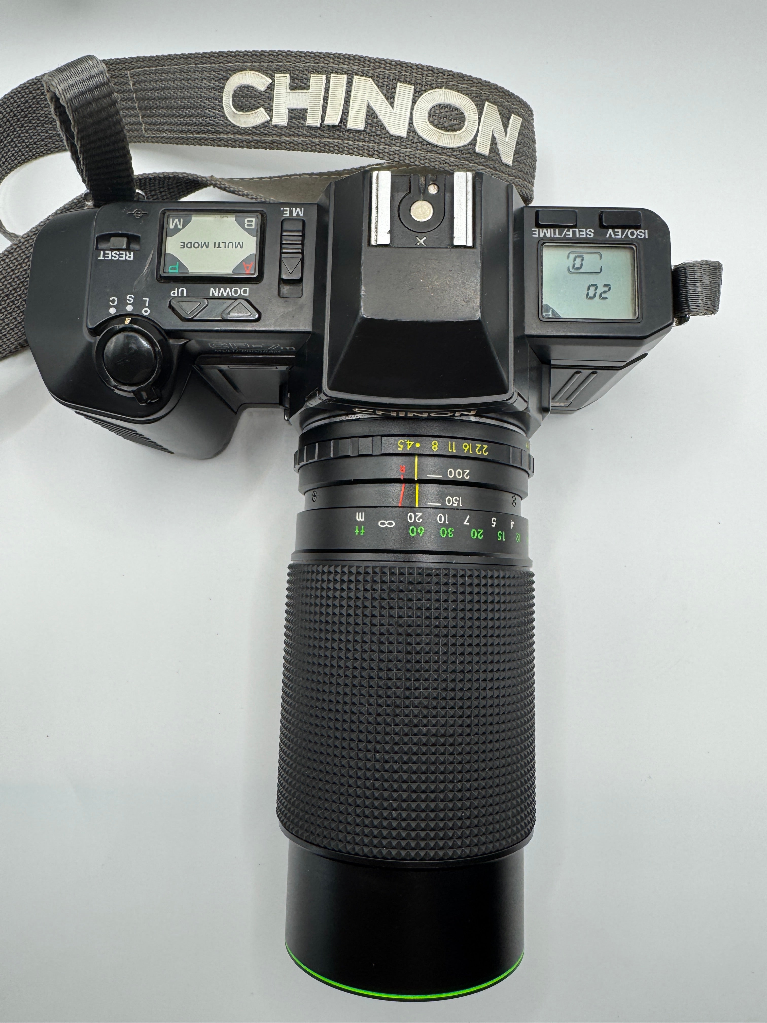 Chinon CP-7m 35mm Film Camera + Hanimex 80–200mm f/4.5 Zoom Lens
Fully Tested | Excellent Condition | Ready to Shoot