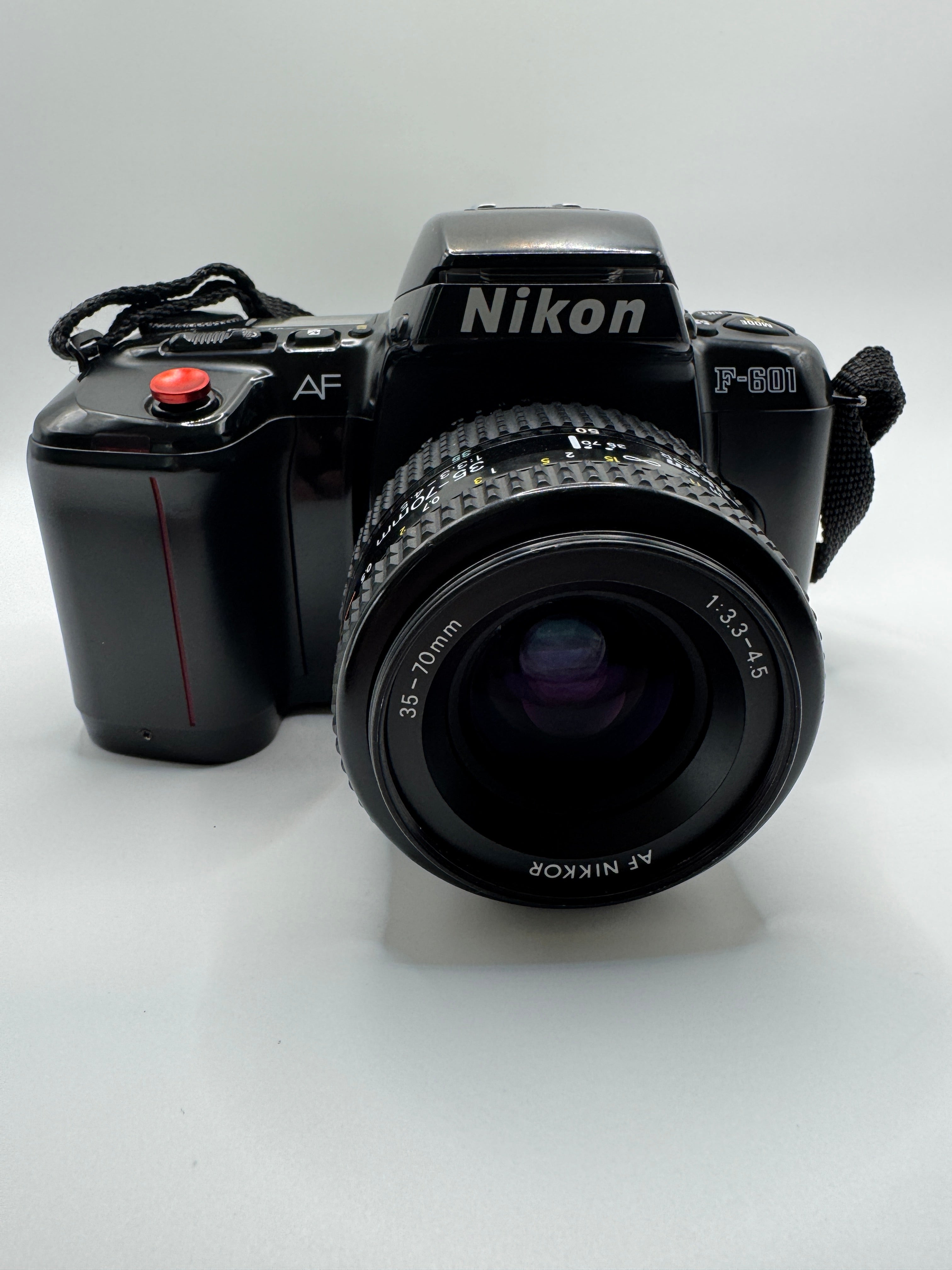 Nikon F-601 (N6006) 35mm Film Camera + AF Nikkor 35–70mm Lens
Fully Tested | Excellent Condition | Ready to Shoot