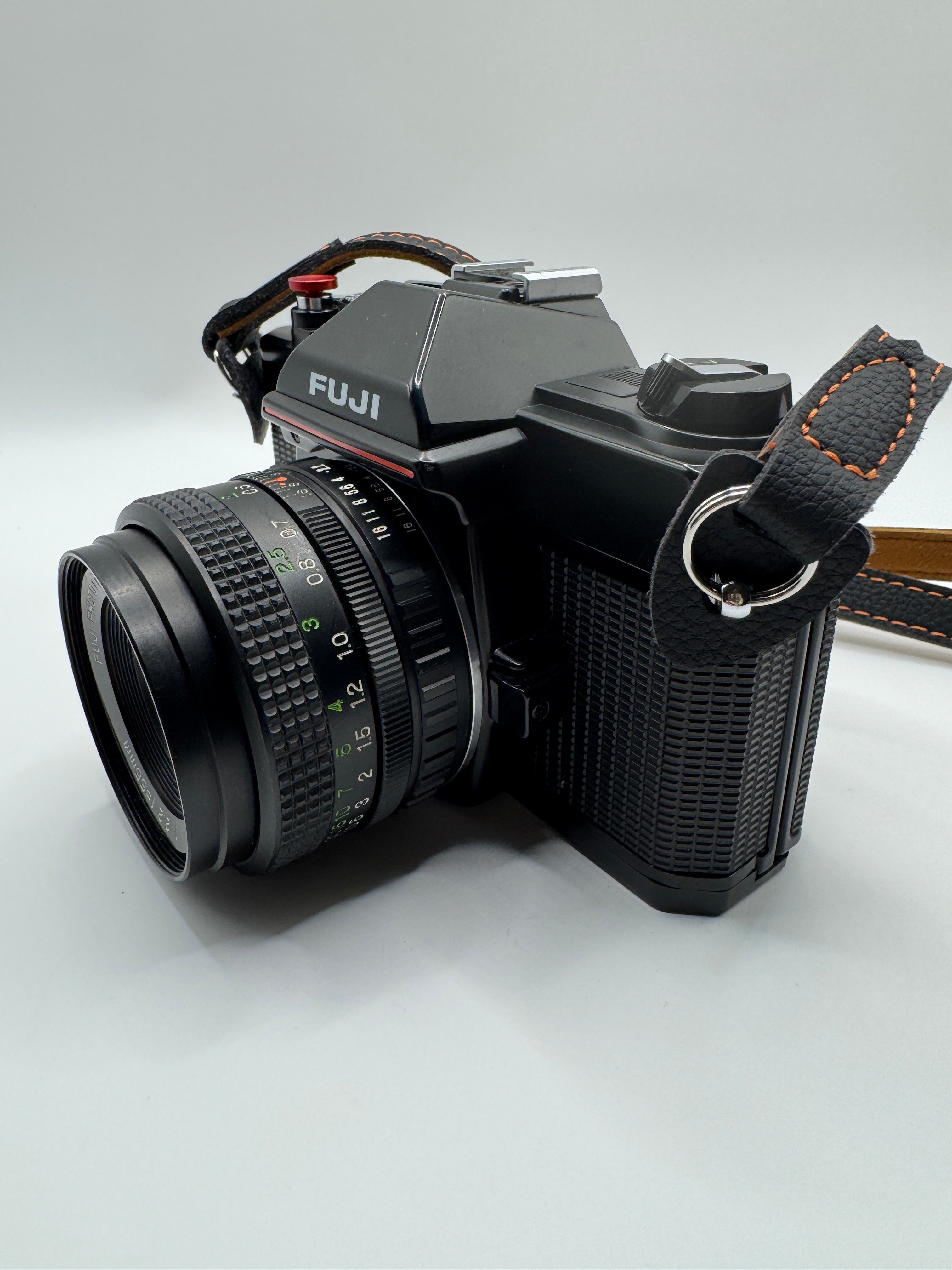 Fuji STX-2 35mm Film Camera + Fujinon 55mm f/2.2 Lens
Fully Tested | Excellent Condition | Ready to Shoot